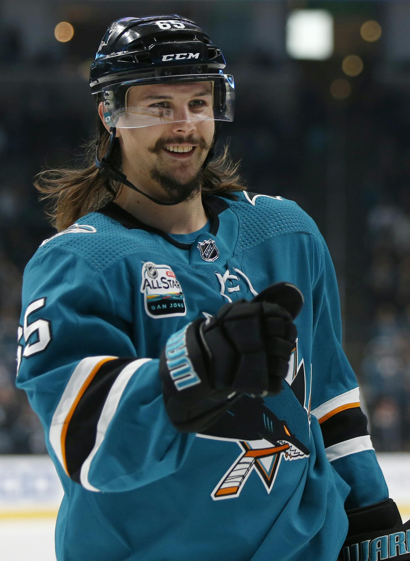 San Jose Sharks' Erik Karlsson (65) celebrates a goal by teammate Antti Suomela against the Nashville Predators in the first period of an NHL hockey game in San Jose, Calif., Tuesday, Nov. 13, 2018. (AP Photo/Josie Lepe) ORG XMIT: SJA120