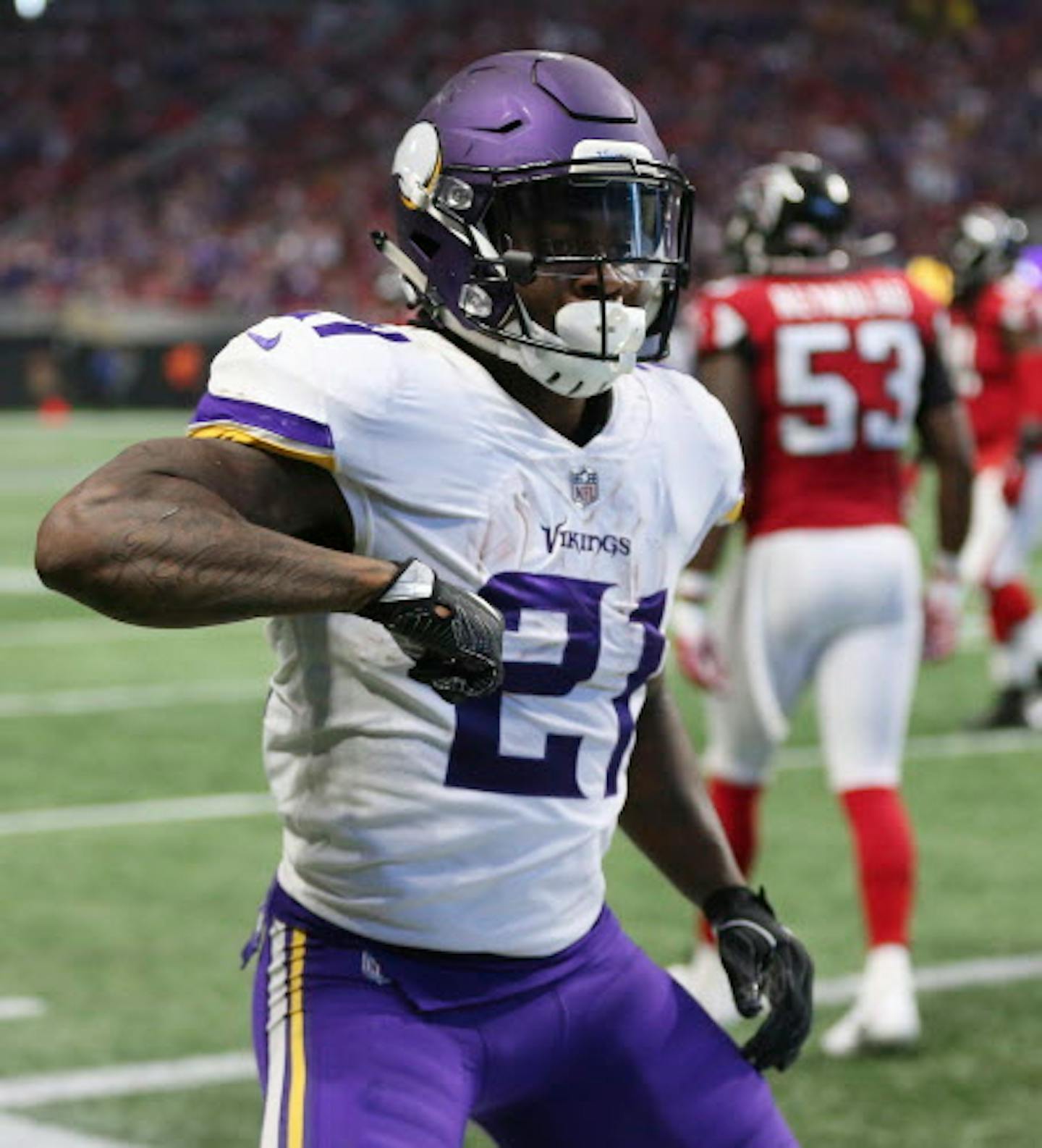 Minnesota Vikings running back Jerick McKinnon (21) celebrates his touchdown against the Atlanta Falcons during the first half of an NFL football game, Sunday, Dec. 3, 2017, in Atlanta. (AP Photo/John Bazemore)