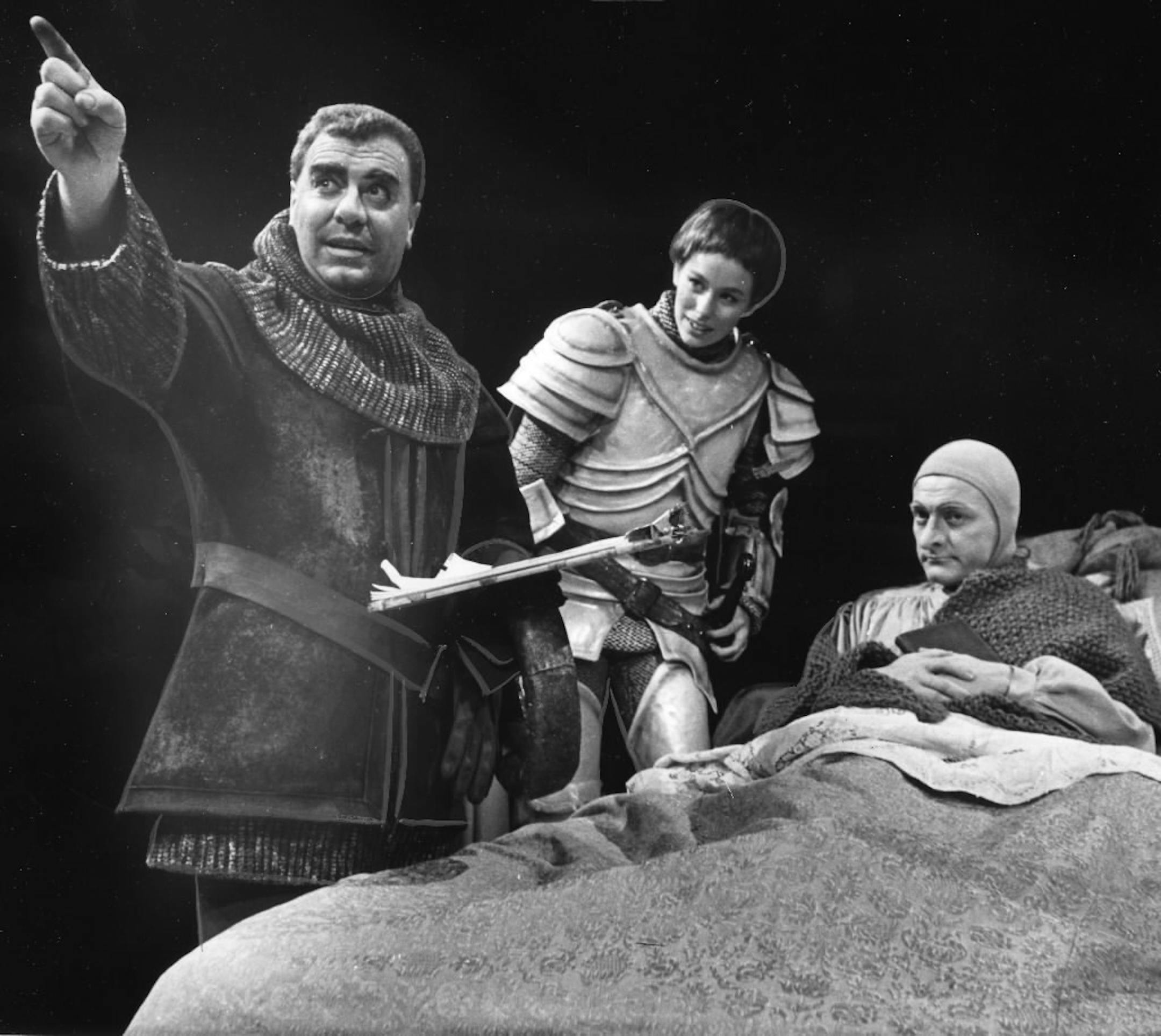 Douglas Campbell (at left) was both actor and director in the play "Saint Joan" at the Guthrie Theater in 1964. At center is Ellen Geer, and at right is George Grizzard. Minneapolis Tribune photo April 23, 1964, by Powell Krueger.