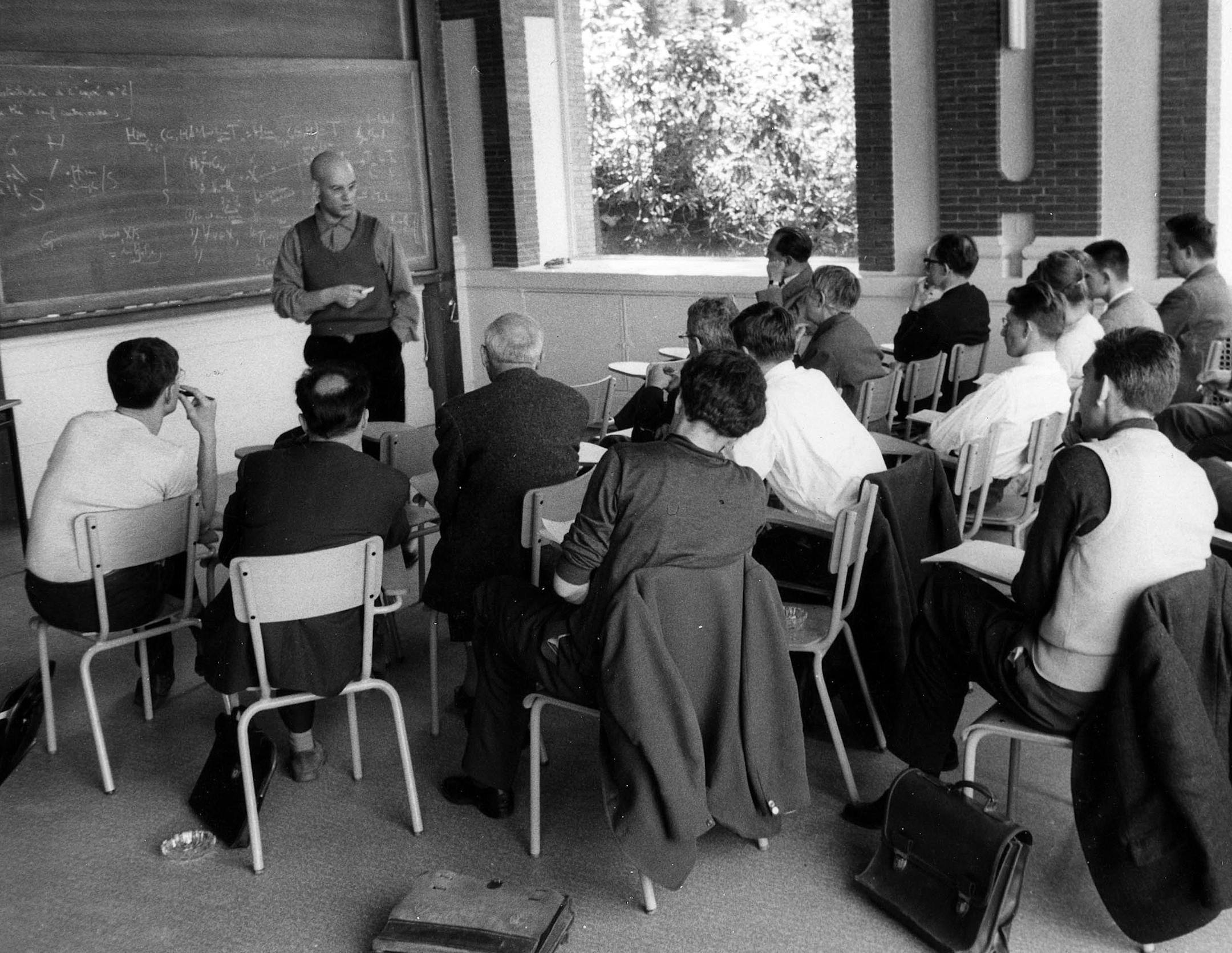 This photo provided Friday, Nov.14, 2014 by the IHES (High Scientific Studies Institute) shows mathematician Alexandre Grothendieck, at the blackboard, during a lesson, south of Paris, in the 1960's. Grothendieck, an opinionated and reclusive German-born giant of 20th-century mathematics who shunned accolades and supported pacifist and environmental causes, has died, the French presidency said Friday. He was 86. (AP Photo/IHES)