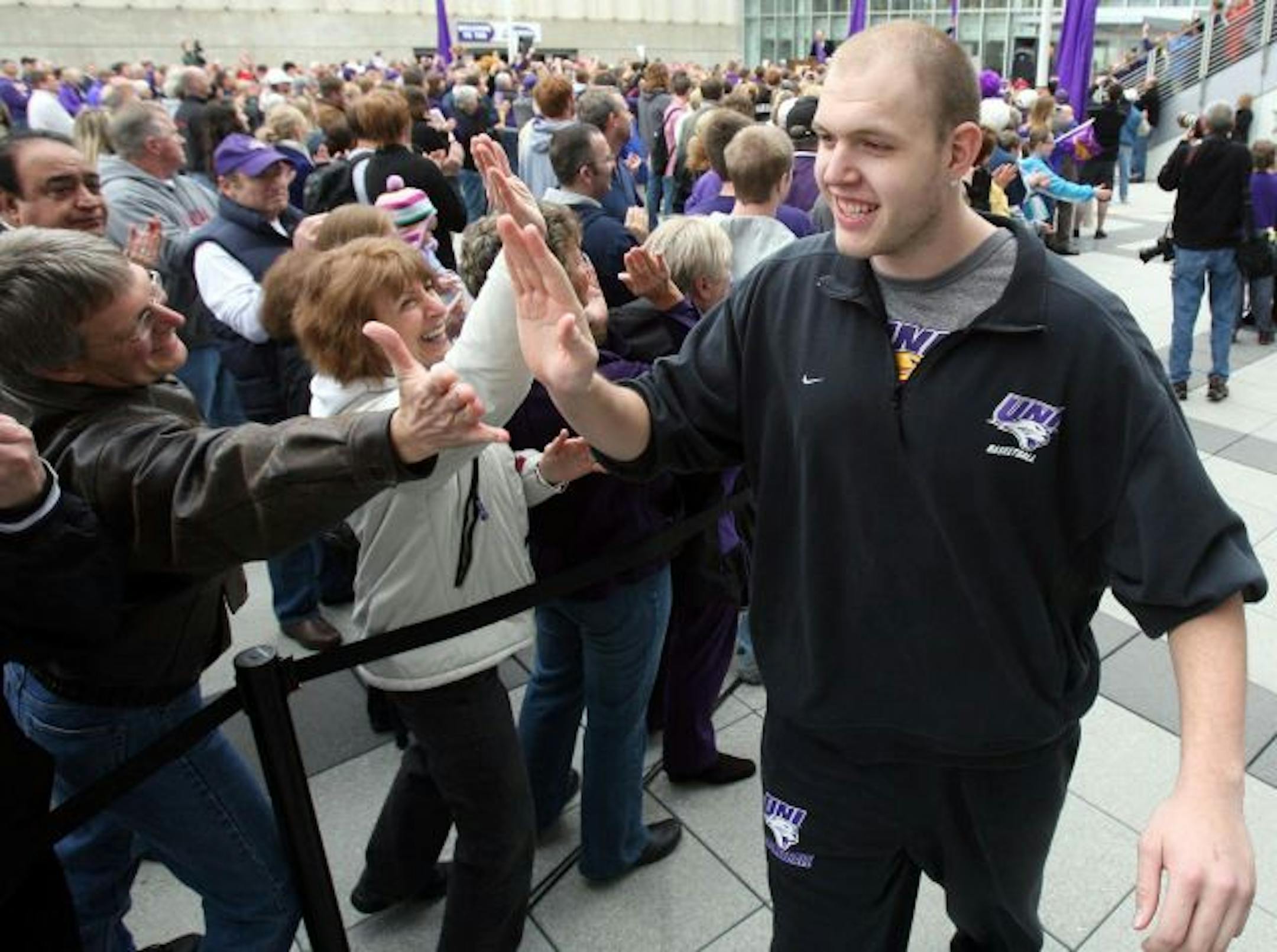 Northern Iowa 7-foot center Jordan Eglseder had a very large high-five for several fans during the Panthers' sendoff Wednesday.