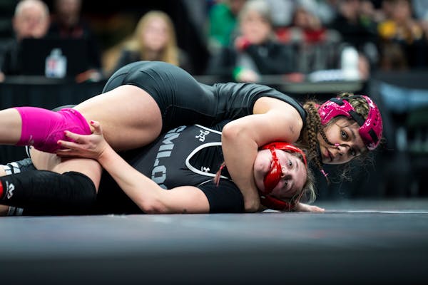Apple Valley’s Cassie Gonzales had an advantage over Diann Smith of Grand Meadow-LeRoy-Ostrander-Southland in the final at 136. Gonzales won and com