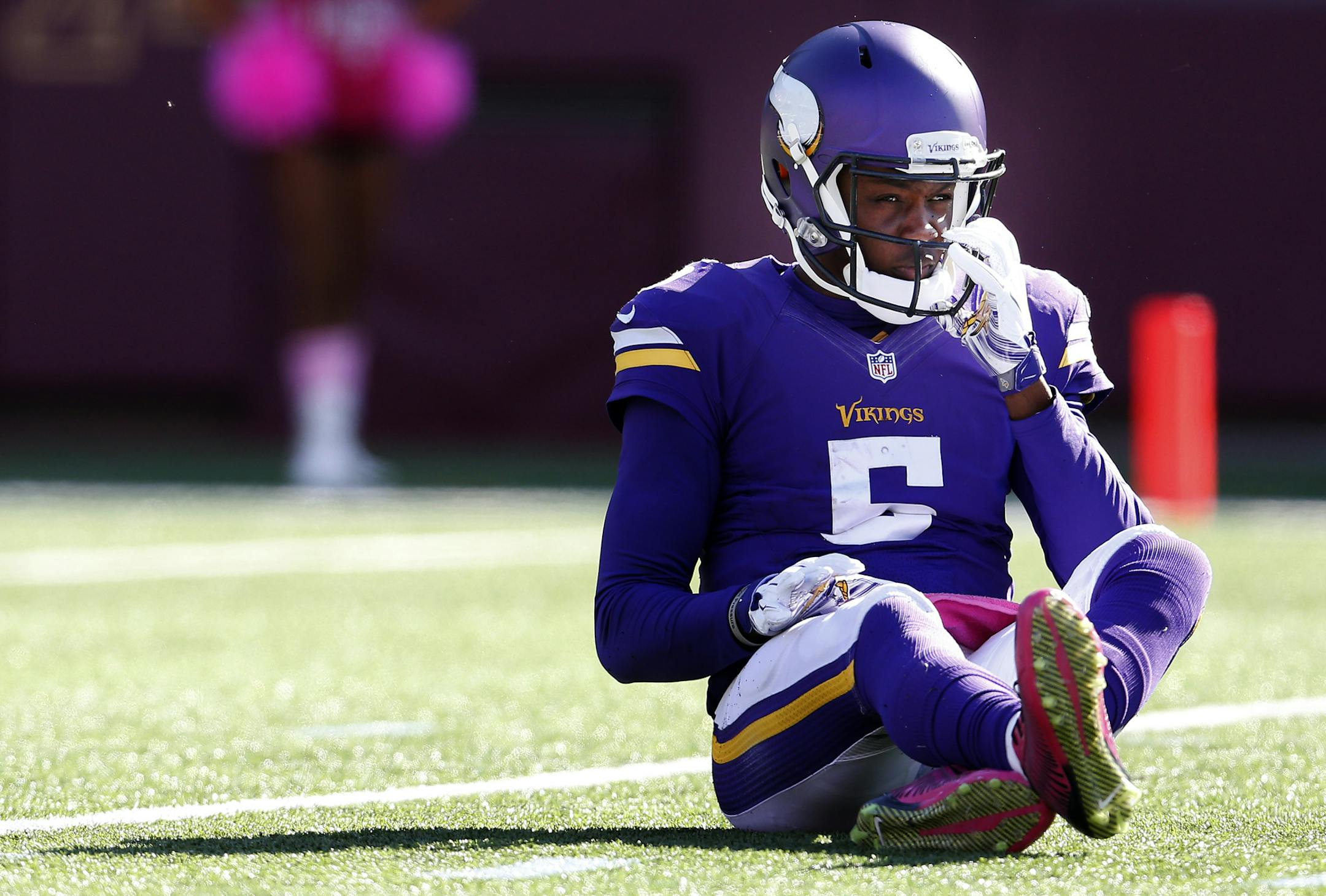 Minnesota Vikings rookie quarterback Teddy Bridgewater (5) sat on the ground after being pressured and hit in the fourth quarter. Detroit beat Minnesota by a final score of 17-3. ] CARLOS GONZALEZ cgonzalez@startribune.com - October 12, 2014 , Minneapolis, Minn., NFL, TCF Bank Stadium, Minnesota Vikings vs. Detroit Lions ORG XMIT: MIN1410121602047616