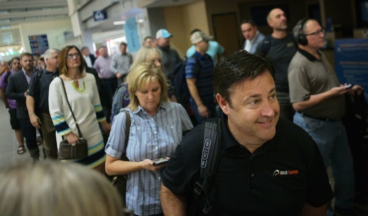 Road warrior Sean Stapleton waited in line for his flight. "This is the worst I have ever seen," said the software CEO from Carver who flies over 250,000 miles a year.