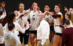 Gophers coach Hugh McCutcheon looked on as the team huddled up before a match earlier this season.