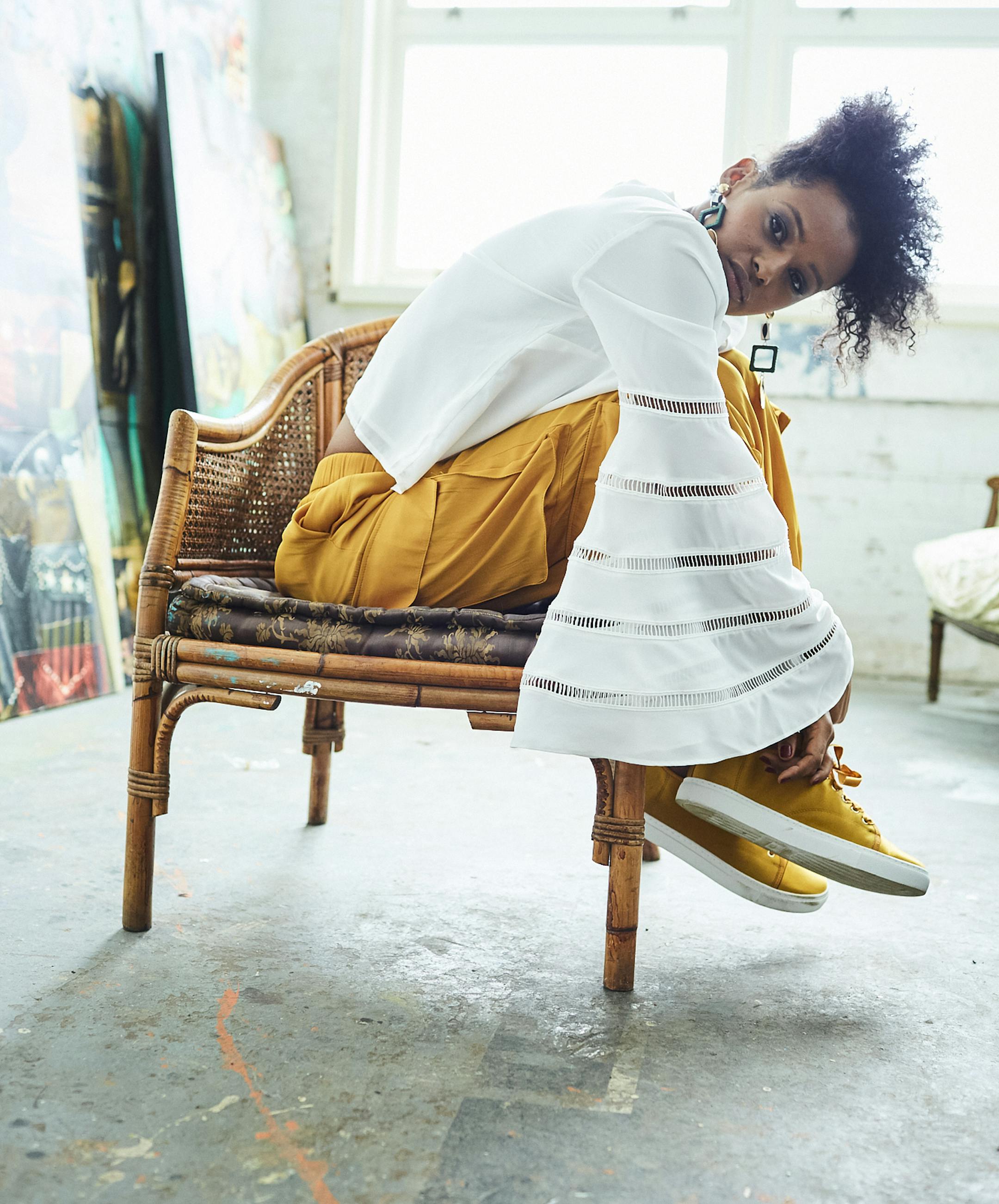 Hip Hop Harem
Bell sleeve top $35 nordstromrack.com
Harem pant $40 zara.com
Lanvin satin low tops $468 farfetch.com
Earring $15 hm.com Styling by Barbara Schmidt // Photos by Shannon Greer Hair and Make-up Artist: Morgan Blaul, morganblaul.com; Model: Meron, Wilhelmina.com