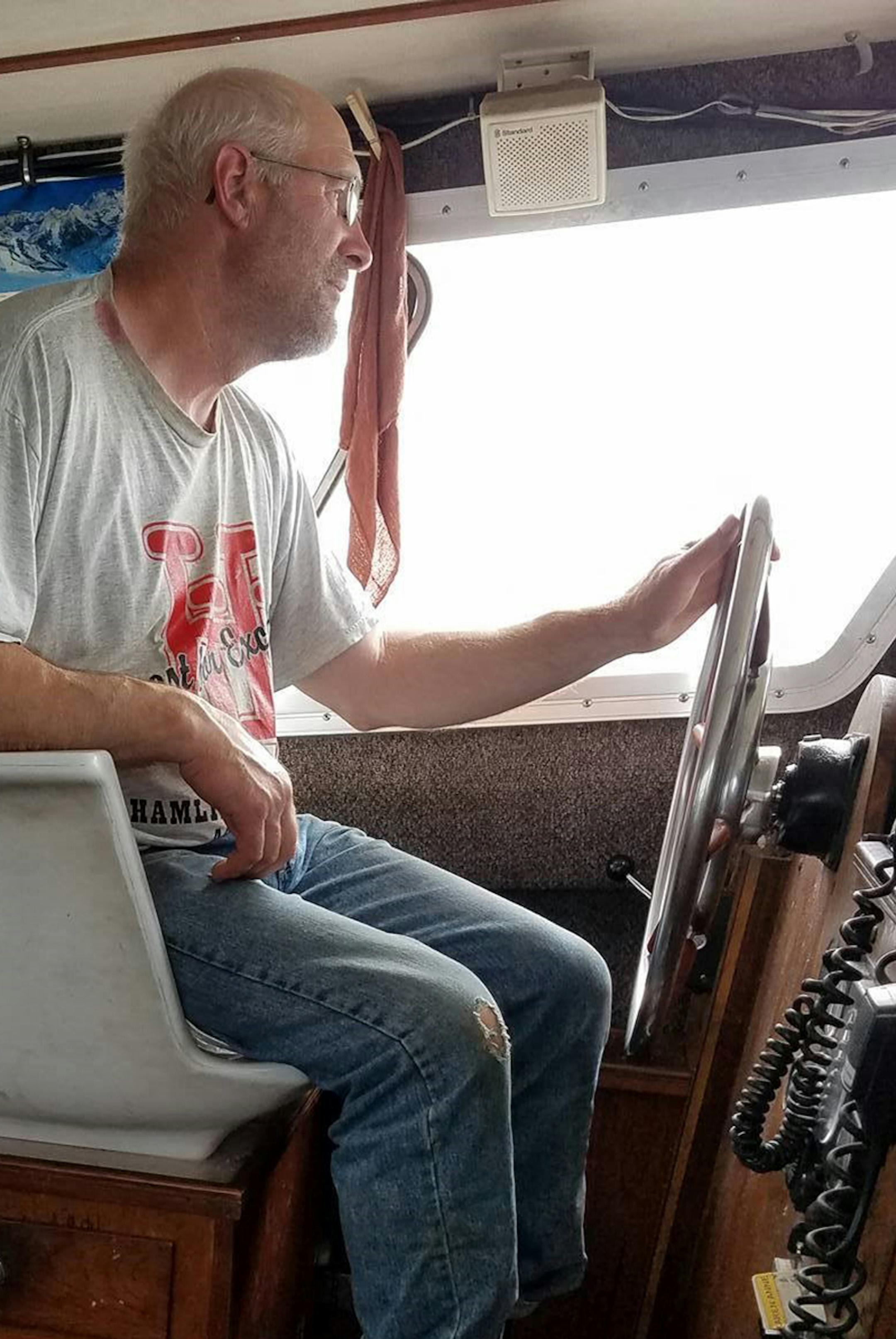 Provided by Tom Rogotzke Roger Rogotzke at the helm of his boat, the Karen Anne. Roger has been fishing in Bristol Bay since 1982.