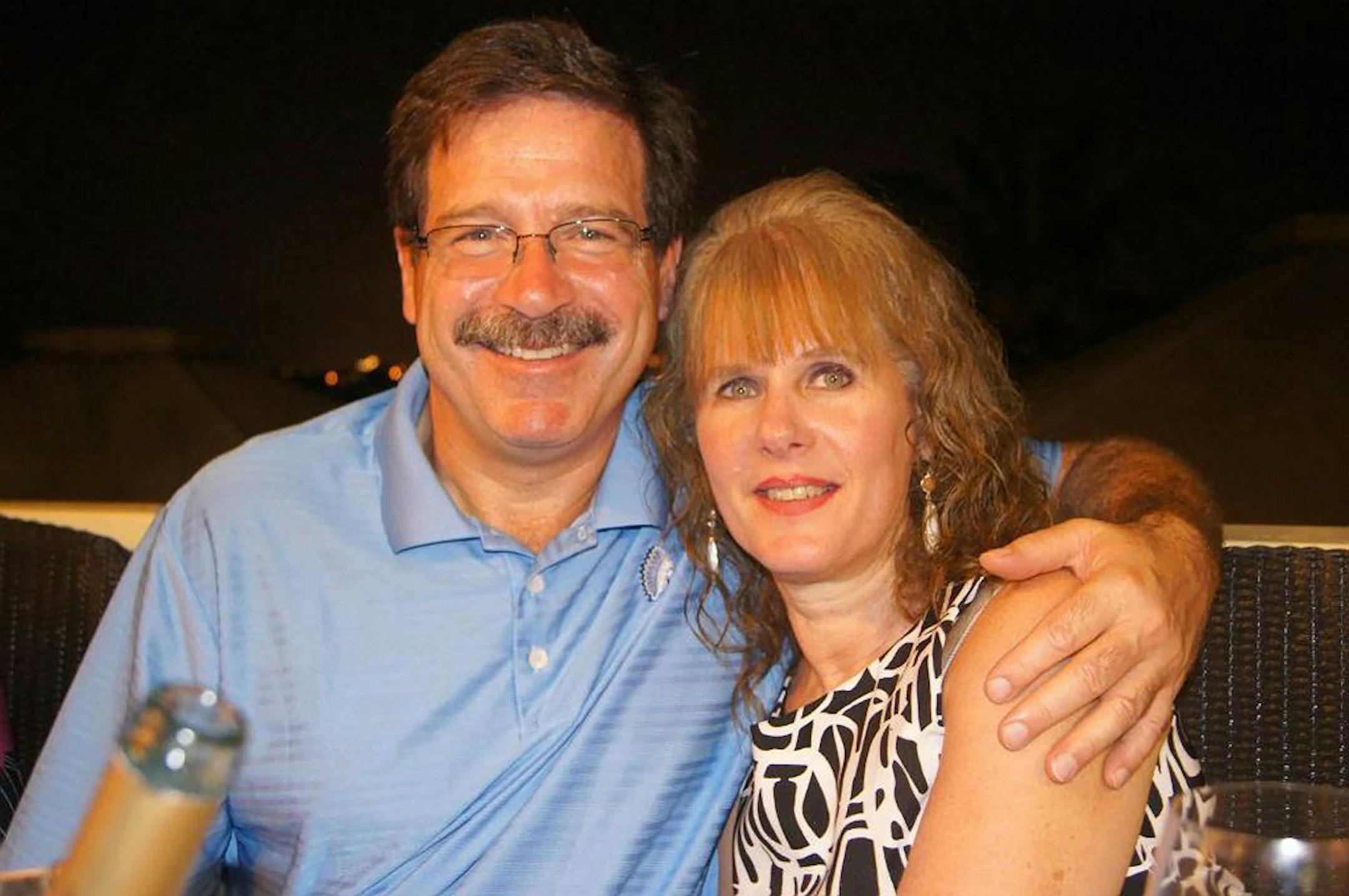 In this undated photo provided by Mark Sherlach, Mark Sherlach and his wife, school psychologist Mary Sherlach, pose for a photo. Mary Sherlach was killed Friday, Dec. 14, 2012, when a gunman opened fire at Sandy Hook Elementary School, in Newtown, Conn., killing 26 children and adults at the school.