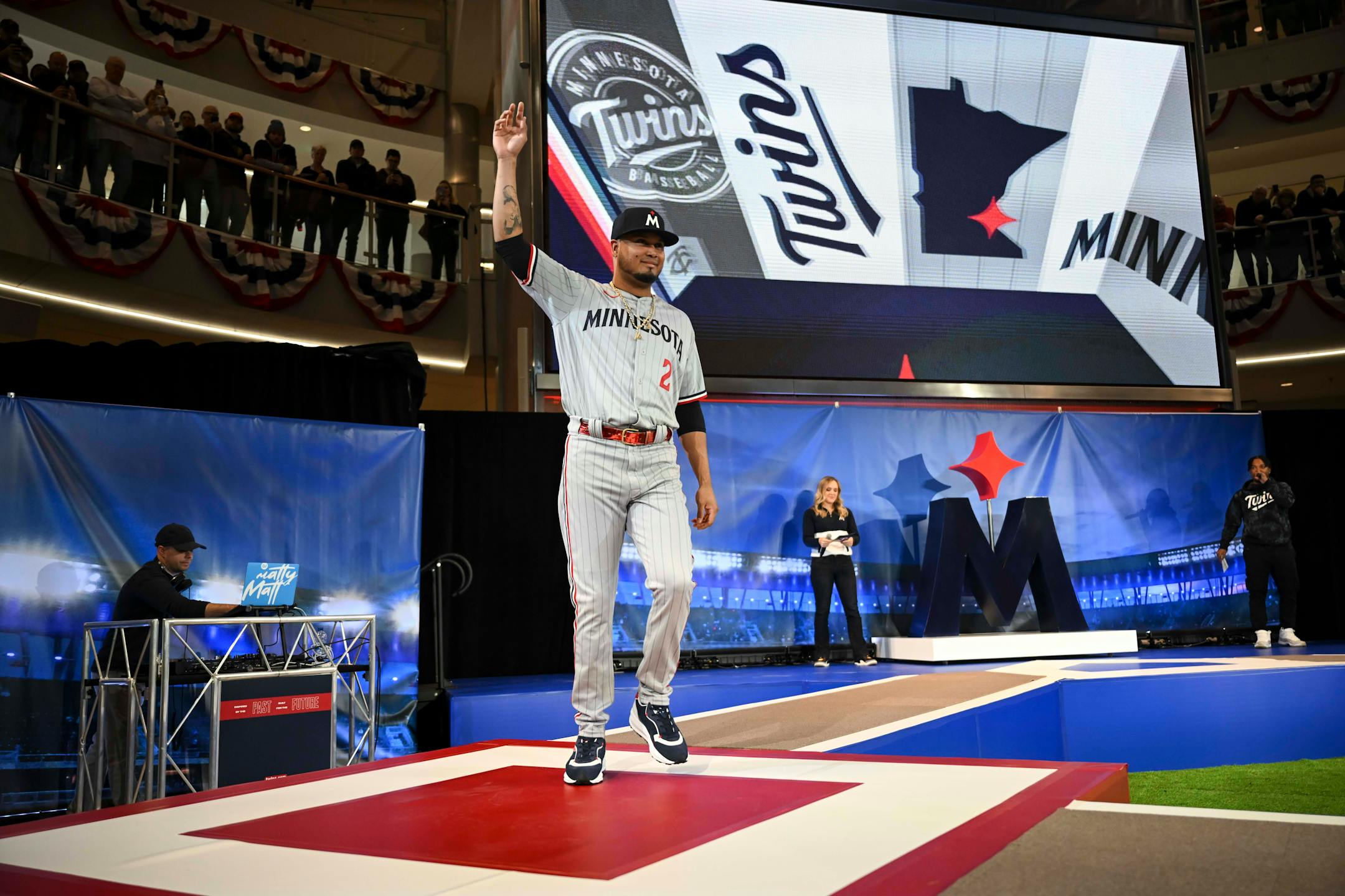 Minnesota Twins first baseman Luis Arraez (2) models a new Twins jersey.