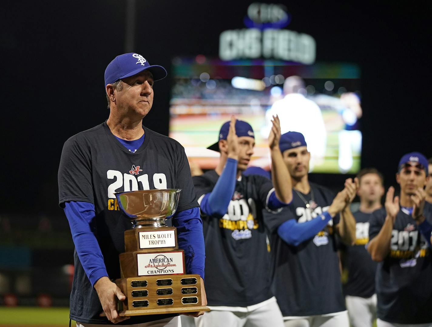 Manager George Tsamis holds the championship trophy. ] LEILA NAVIDI &#x2022; leila.navidi@startribune.com BACKGROUND INFORMATION: The Saint Paul Saints play the Sioux City Explorers in Game 3 of the American Association Championship Series at CHS Field in St. Paul on Saturday, September 14, 2019. The Saint won the game 6-3 to become the 2019 American Association Champions.