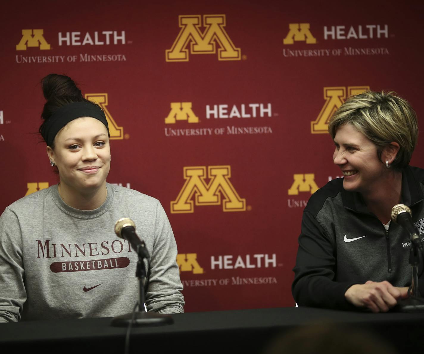 Rachel Banham announced she will play another year as a Gopher after a knee injury forced her to miss most of this season, on Friday, January 23, 2015 at the University of Minnesota in Minneapolis, Minn. She is photographed with head coach Marlene Stollings, right. ] RENEE JONES SCHNEIDER &#x2022; reneejones@startribune.com