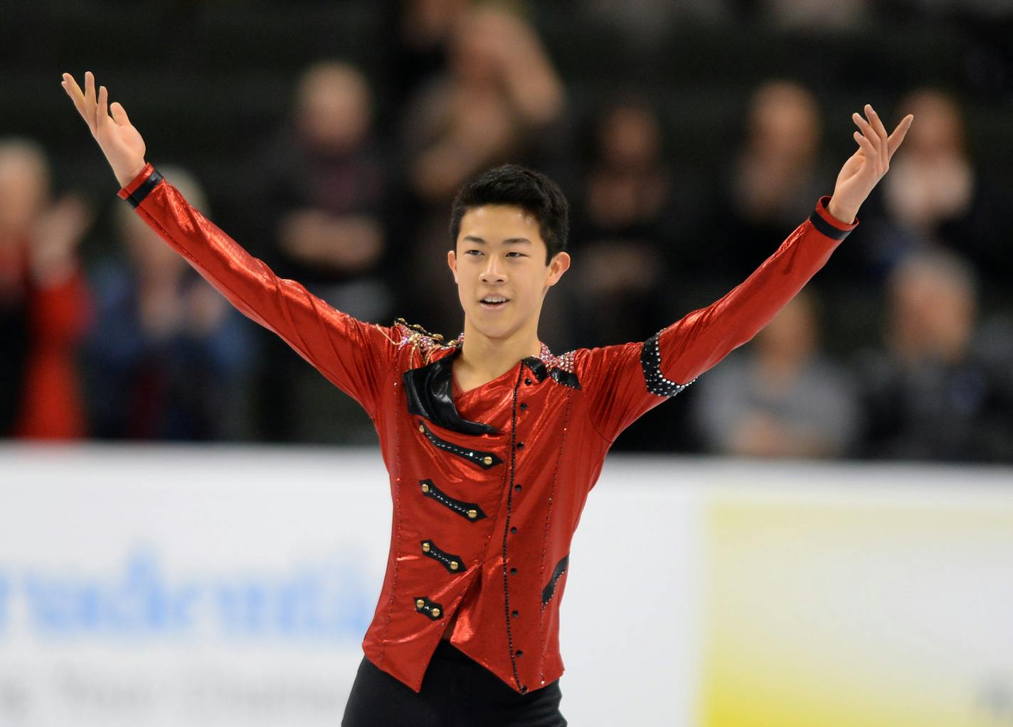 Nathan Chen acknowledged fans after his performance in the Championship Men's Short Program of the 2016 Prudential U.S. Figure Skating Championships Friday night. He leads with an unofficial score of 86.33 after the first group. ] (AARON LAVINSKY/STAR TRIBUNE) aaron.lavinsky@startribune.com The Championship Men's Short Program of the 2016 Prudential U.S. Figure Skating Championships was held at Xcel Energy Center on Friday, Jan. 22, 2016 in St. Paul, Minn.