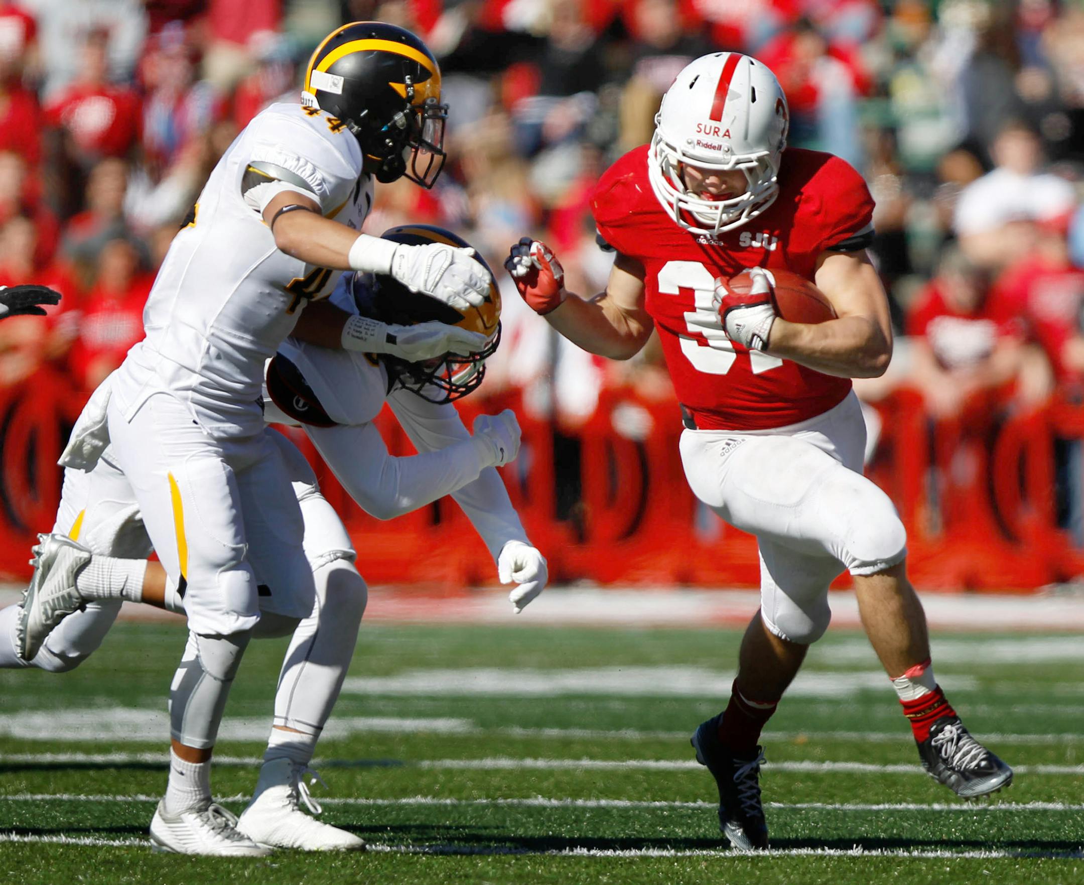 Sam Sura rushed for 201 yards and four touchdowns in the win. Johnnies football October 17, 2015 Please credit them to Sean Donohue