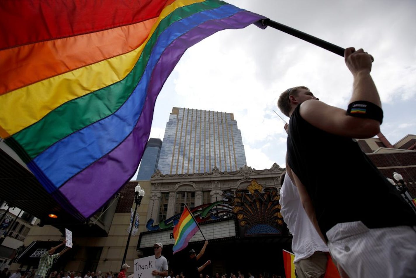 Some participants carried rainbow flags during the 2010 Ashley Rukes GLBT Pride Parade held on Hennepin Ave. in downtown Minneapolis on Sunday.