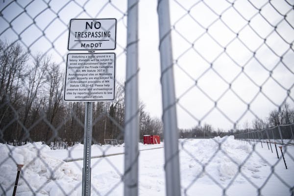 A fence and No Trespassing signs have been setup around an MnDOT site that disturbed a Native American burial ground in West Duluth. ]
ALEX KORMANN &#