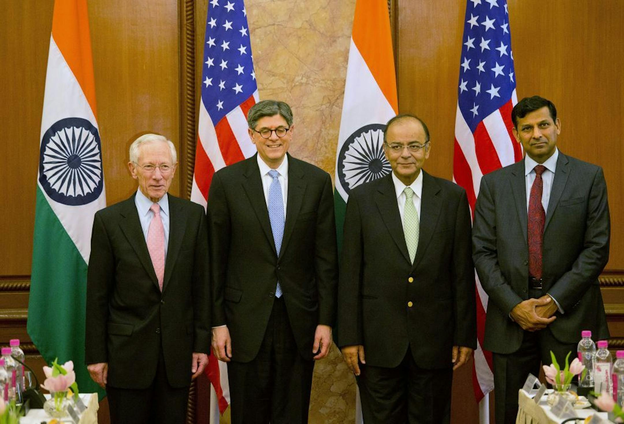 From left, U.S. Federal Reserve Vice Chairman Stanley Fischer and Treasury Secretary Jacob Lew stand for a photograph with Indian Finance Minister Arun Jaitley and Reserve bank of India Governor Raghuram Rajan before the start of a delegation level meeting in New Delhi, India, Thursday, Feb. 12, 2015. Lew is on a two-day visit to the country.