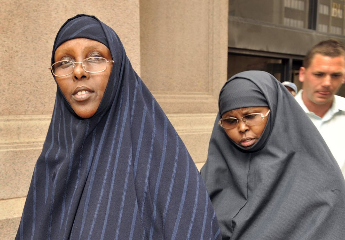 Hawo Mohamed Hassan, left, and Amina Farah Ali entering the federal courthouse during their trial. Al received 20 years in prison while Hassan received 10 years in prison in May 2013. They were among the first set of defendants sent to prison from Minneapolis in the country's ongoing anti-terrorism investigations since Sept. 11, 2001.