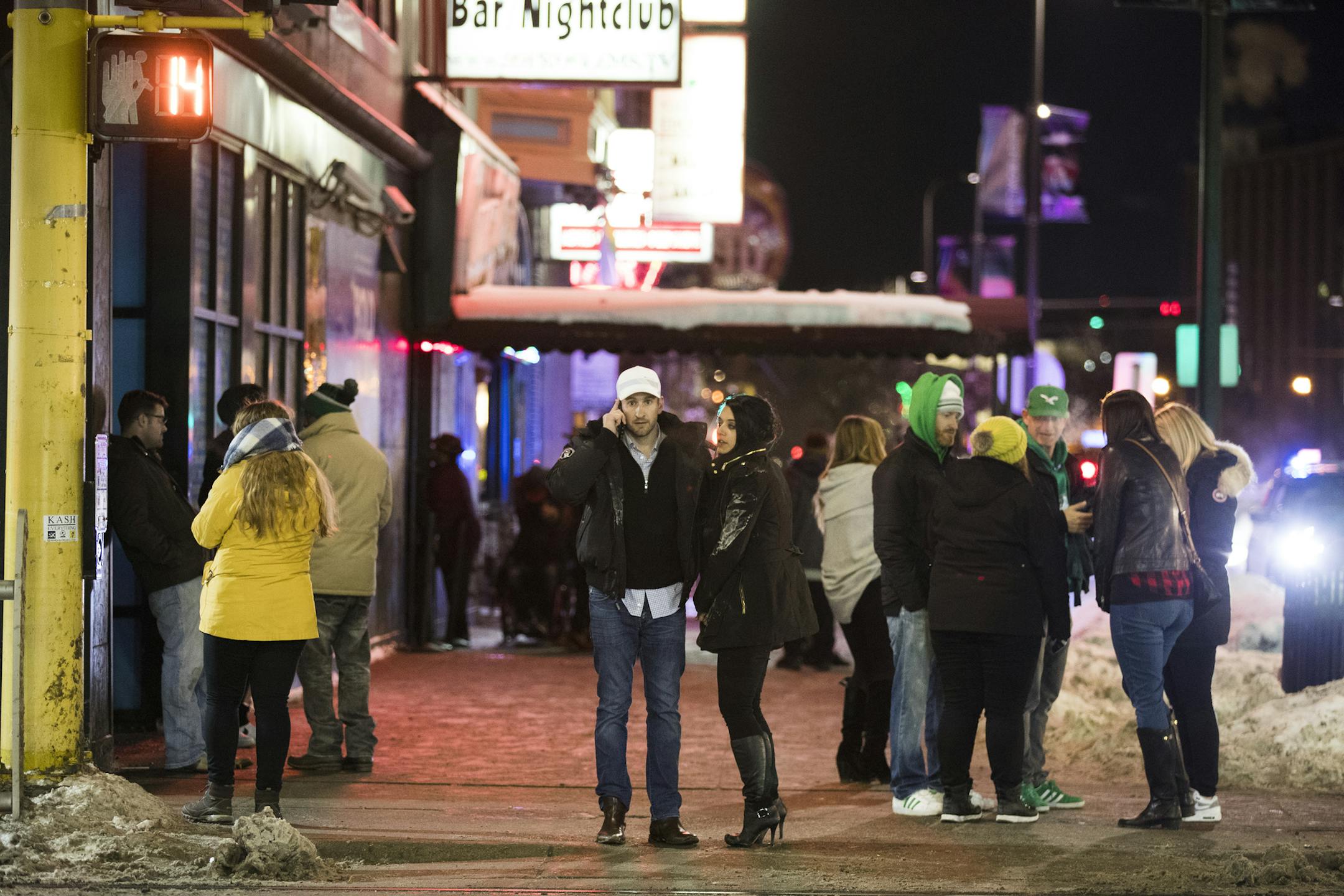 The scene after the 4 a.m. bar close on the corner of 5th Street and Hennepin Avenue. ] LEILA NAVIDI ï leila.navidi@startribune.com BACKGROUND INFORMATION: The scene after the bars closed at 4 a.m. in downtown Minneapolis the morning after the Super Bowl on Monday, February 5, 2018.