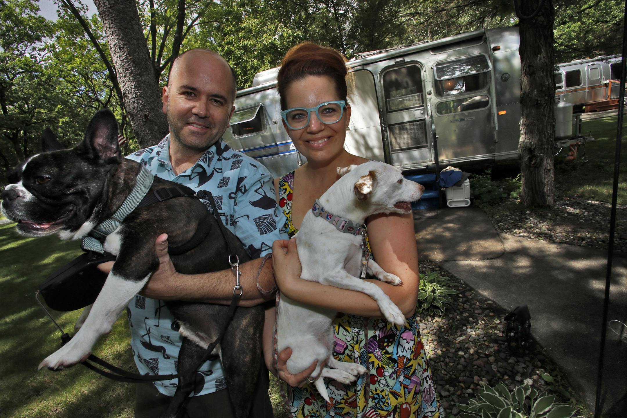 Brad Weller, left, and wife Tracy Tabery-Weller and dogs Pronto Pup and Minnie Pearl outside their Airstream. ] Profile of Airstream trailer owners camped at Minnesota Airstream Park near Clear Lake. (MARLIN LEVISON/STARTRIBUNE(mlevison@startribune.com)