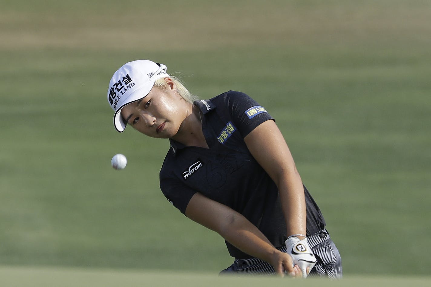 FILE - In this June 2, 2019, file photo, Jeongeun Lee6, of South Korea, chips to the 16th green during the final round of the U.S. Women's Open golf tournament, in Charleston, S.C. Hazeltine has a recent history of shockers, whether it was Rich Beem or Y.E. Yang winning the PGA Championship or the Americans winning the Ryder Cup. Now it hosts the Women's PGA Championship, a major that is rising to the top with the courses it plays. Women's Open champion Jeongeun Lee6 will be part of a strong fie