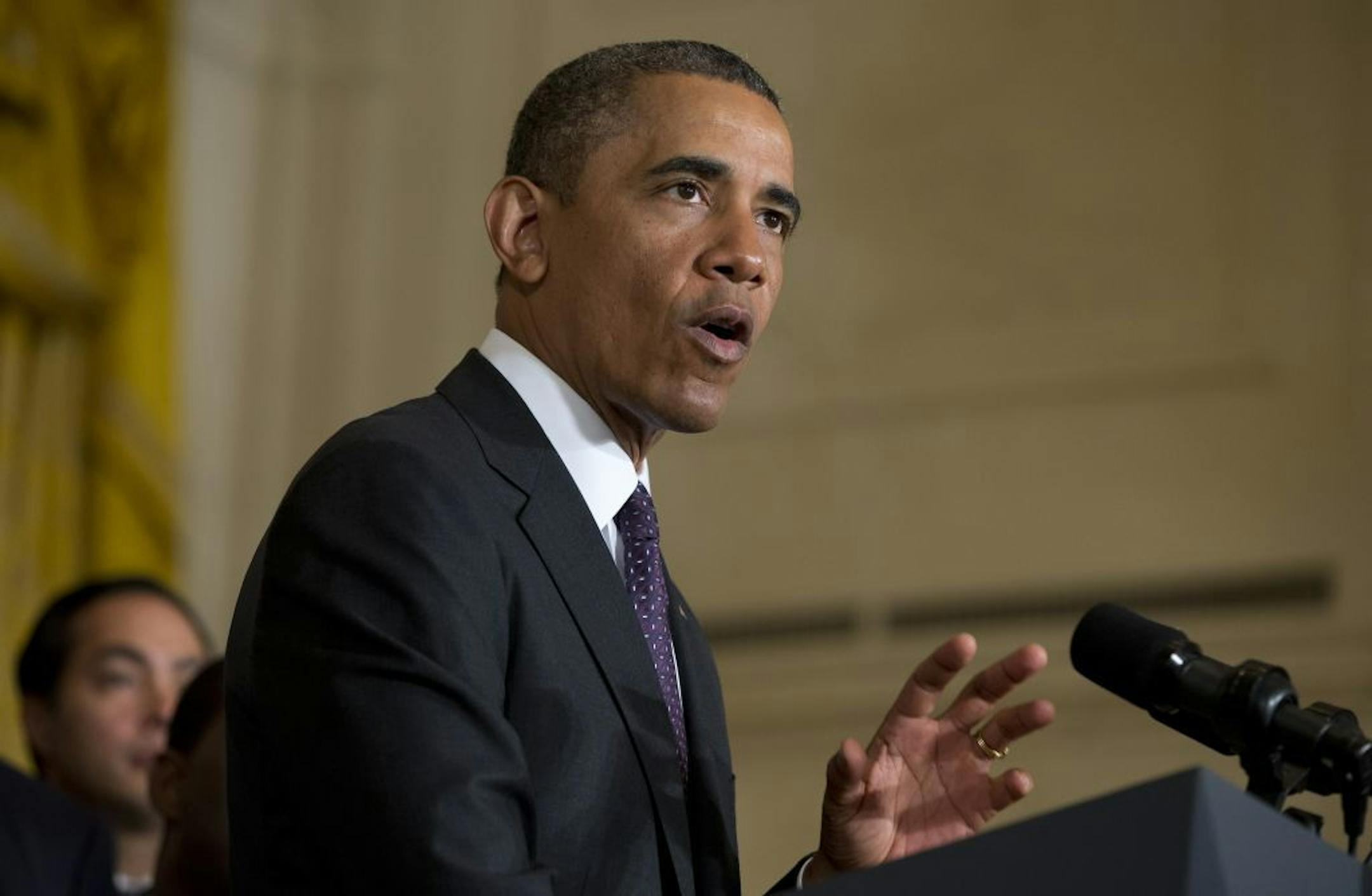 President Barack Obama gestures during remarks on immigration reform in the East Room of the White House on Tuesday, June 11, 2013, in Washington. The Senate is preparing to cast the first votes on a landmark bill that offers the best chance in decades to remake the nation's immigration system and offer eventual citizenship to millions.