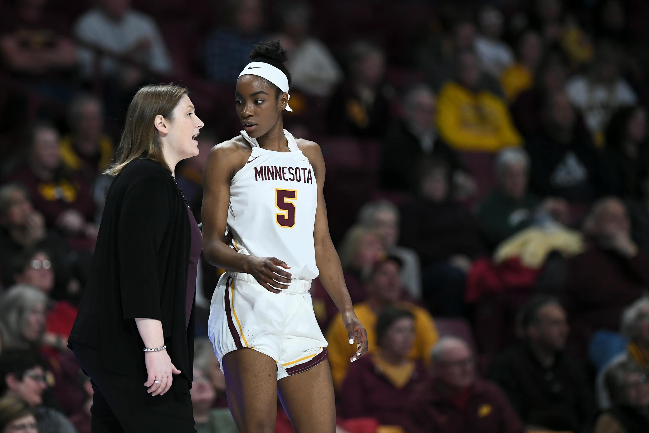 Gophers forward Taiye Bello (shown with coach Lindsay Whalen during an Iowa game in mid-January) had a double-double with 11 points and 13 rebounds, but Minnesota still lost at Indiana 65-52 on Monday night.