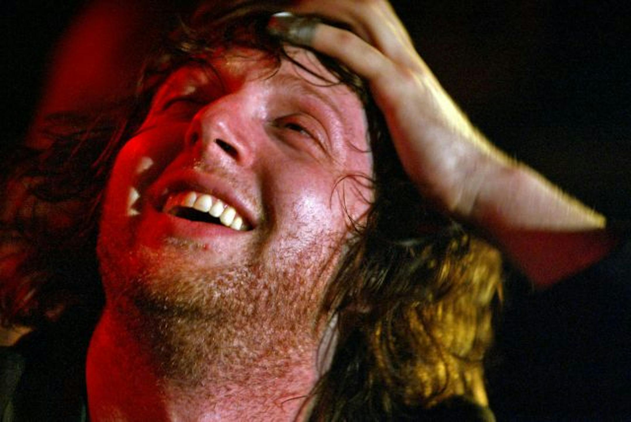 Here's what Mark Mallman looked like at the finish line for his 52-hour marathon in 2004.