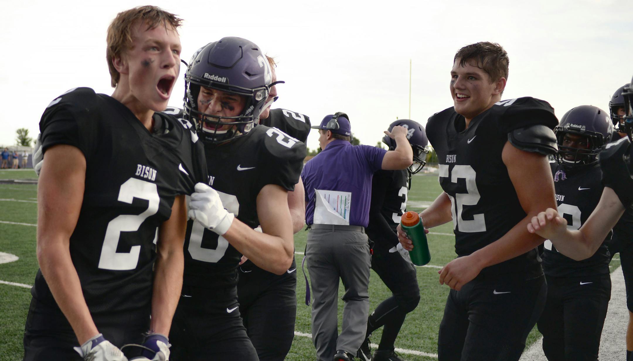Buffalo junior defensive back Michael Tweten (left) celebrates his 66-yard kickoff return with teammates on the sideline during the second half of the high school football season opener Friday afternoon at Buffalo High School. The Buffalo Bison came out victorious over the Brainerd Warriors 38-28. ] (SPECIAL TO THE STAR TRIBUNE/BRE McGEE)
**Michael Tweten (Buffalo, 2)