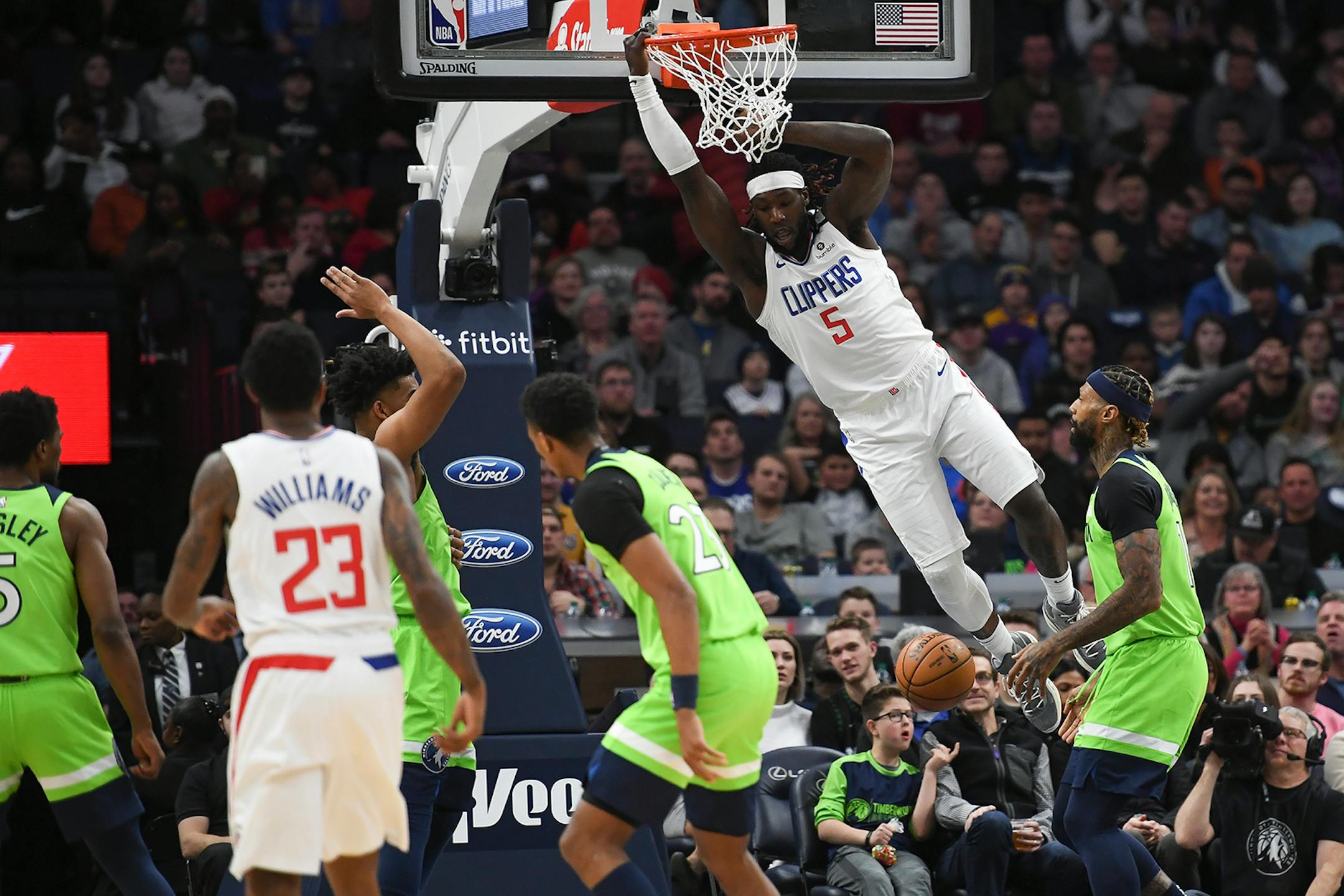 LA Clippers forward Montrezl Harrell (5) dunked the ball against the Minnesota Timberwolves in the first half.