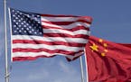 iStockphoto.com
The flag of the United States of America and the flag of the Republic of China fly together on flag poles next to each other.