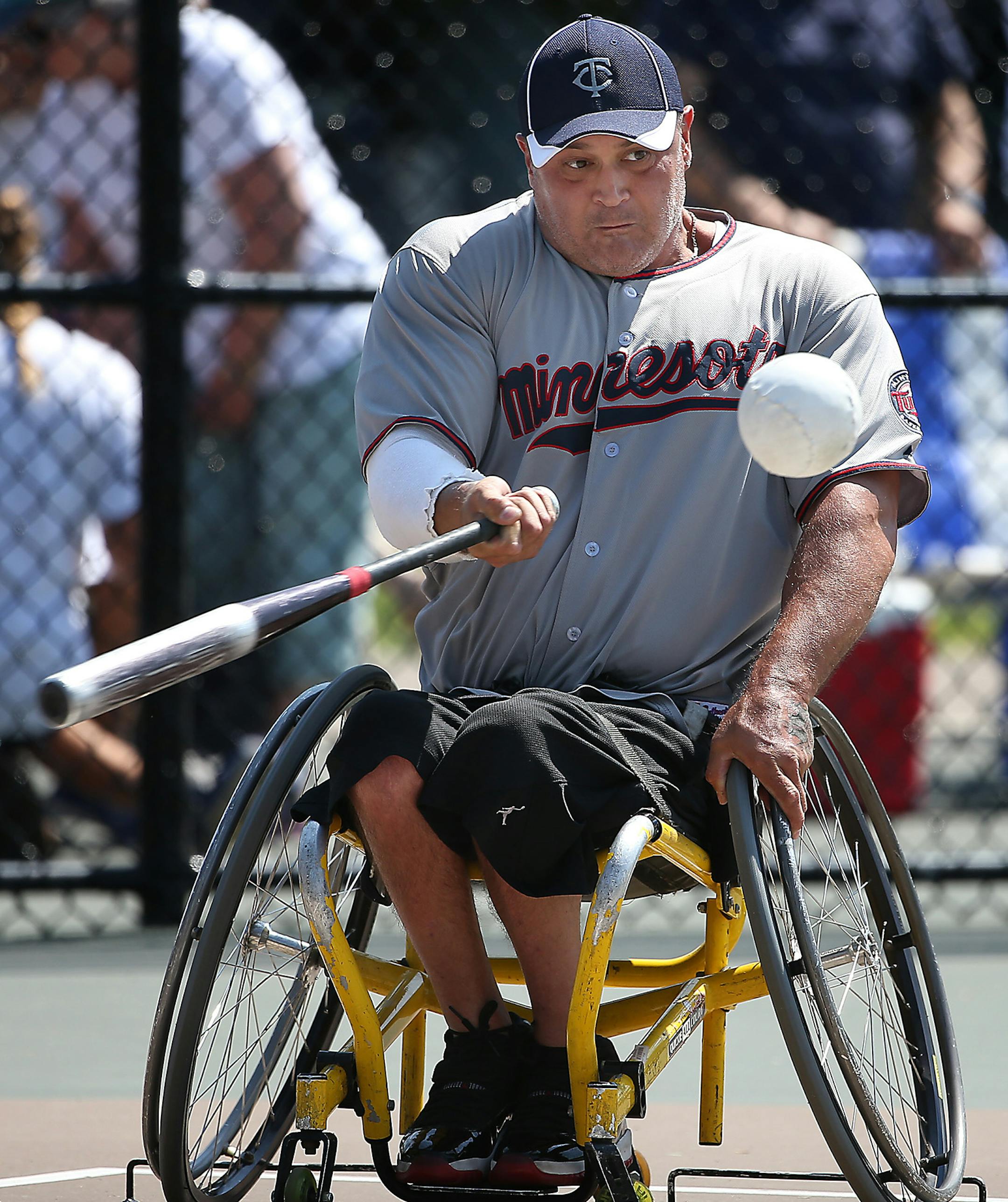 Minnesota Rolling Twins' Brian Chavez hit a double during the first round of play in the Wheelchair Softball World Series, Thursday, August 14, 2014. ] (ELIZABETH FLORES/STAR TRIBUNE) ELIZABETH FLORES • eflores@startribune.com