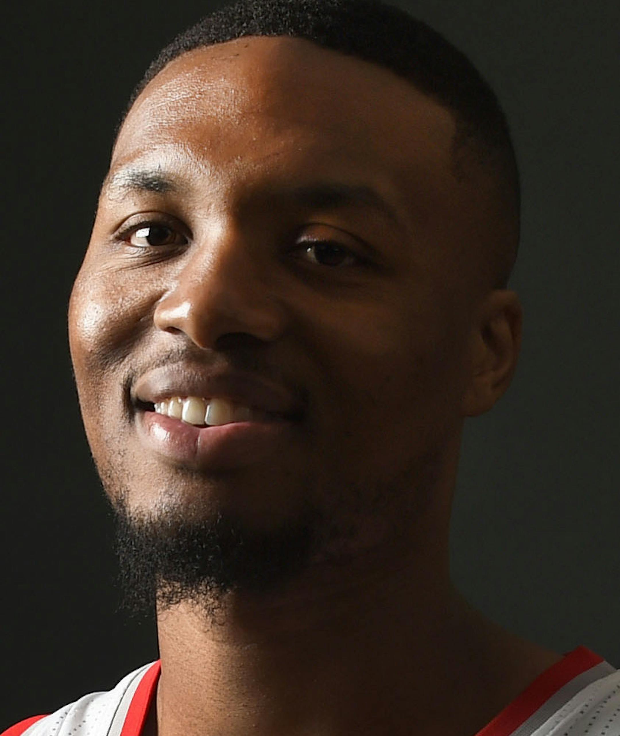 Portland Trail Blazers guard Damian Lillard (0) poses for a photograph during NBA basketball media day in Portland, Ore., Monday, Sept. 26, 2016. (AP Photo/Steve Dykes) ORG XMIT: ORSD165