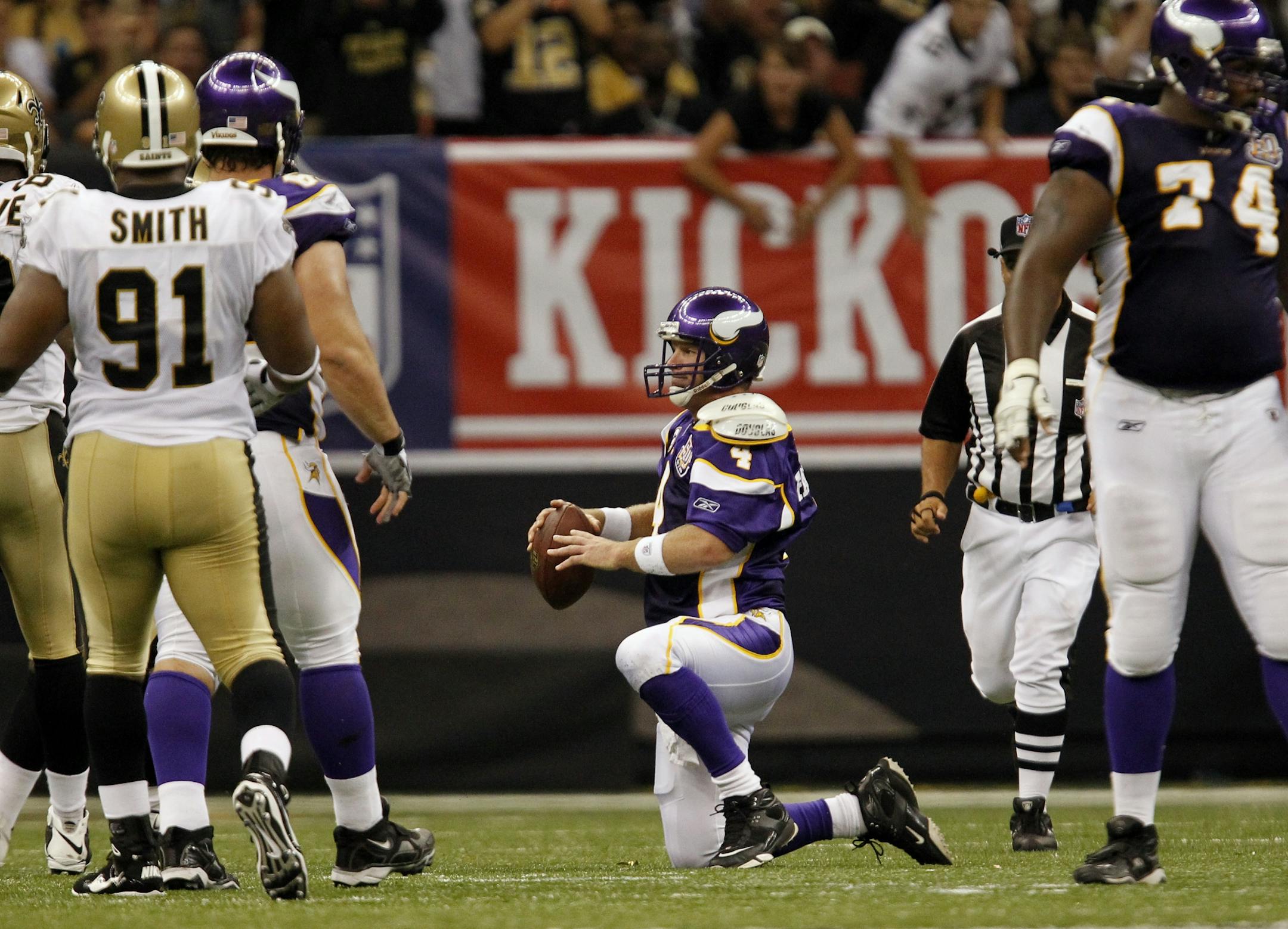 Vikings quarterback Brett Favre got to his feet after being sacked by the Saints in the third quarter Thursday.