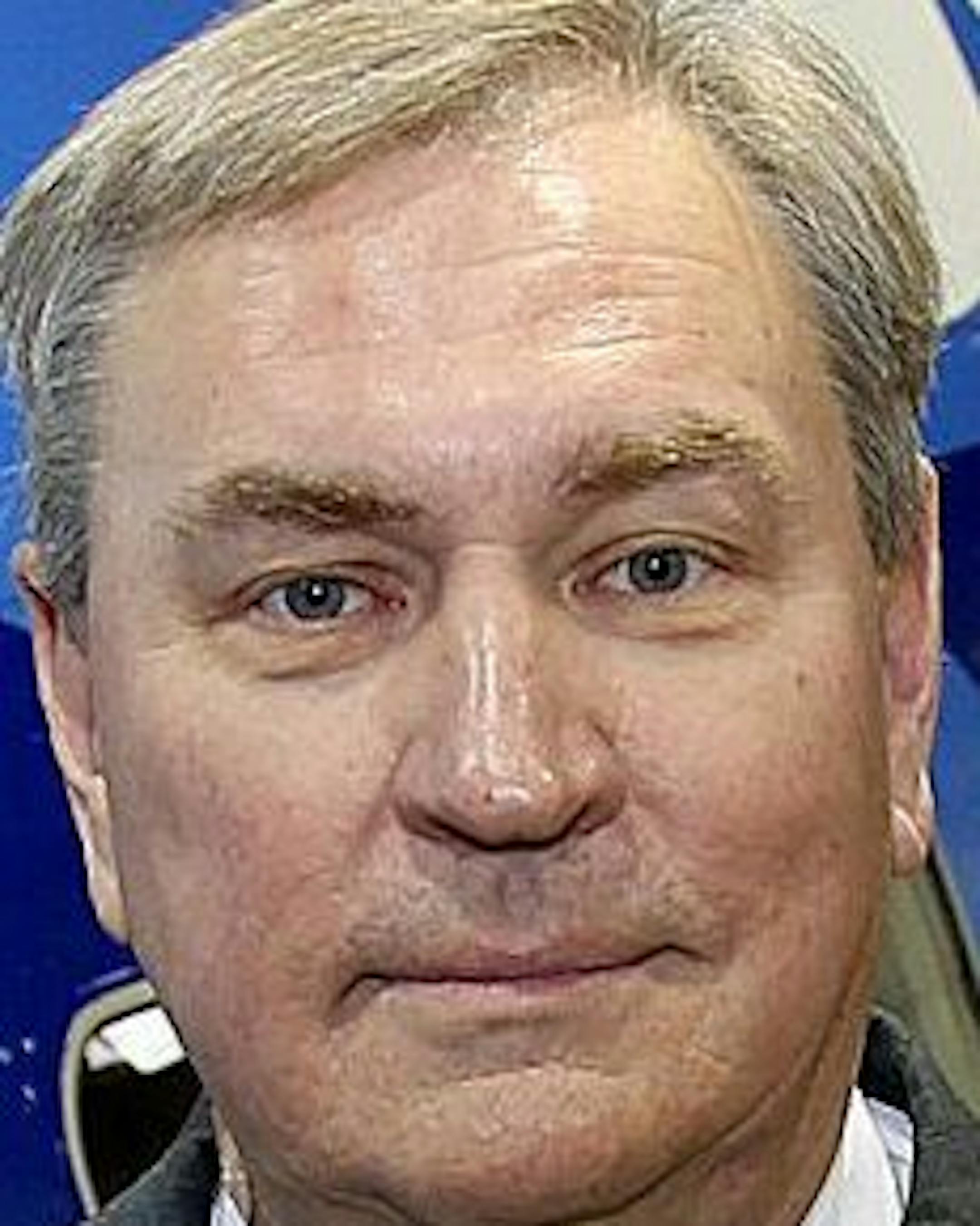 Sun Country's Stan Gadek, chief executive officer and key strategist behind the airline's turn around under the new ownership of Marty Davis and his Cambria countertop manufacturing family, stood in front of one of the airplanes, Wednesday, November 7, 2012 in Bloomington, MN. (ELIZABETH FLORES/STAR TRIBUNE) ELIZABETH FLORES • eflores@startribune.com ORG XMIT: MIN1211072058168203 ORG XMIT: MIN1302131802142247