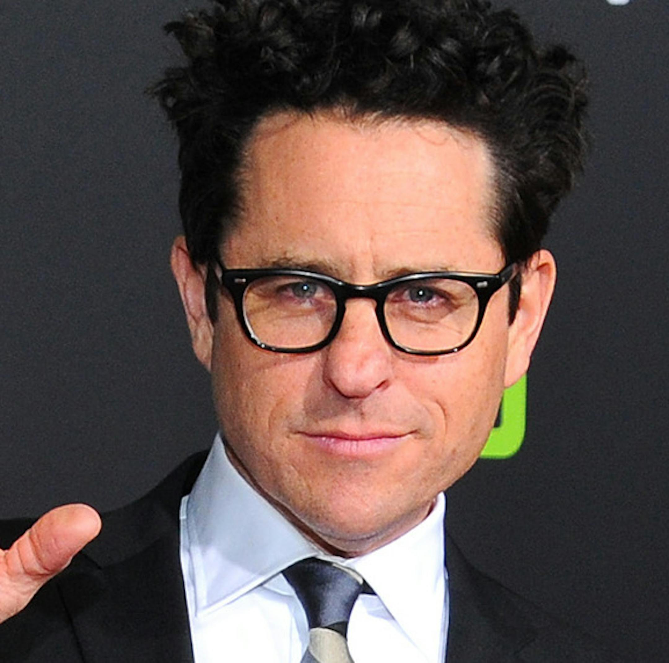 Producer J.J. Abrams waves as he arrives at the premiere of the Hulu Original Series "11.22.63, at The Bruin Theatre on Thursday, Feb. 11, 2016, in Los Angeles. (Photo by Vince Bucci/Invision/AP)