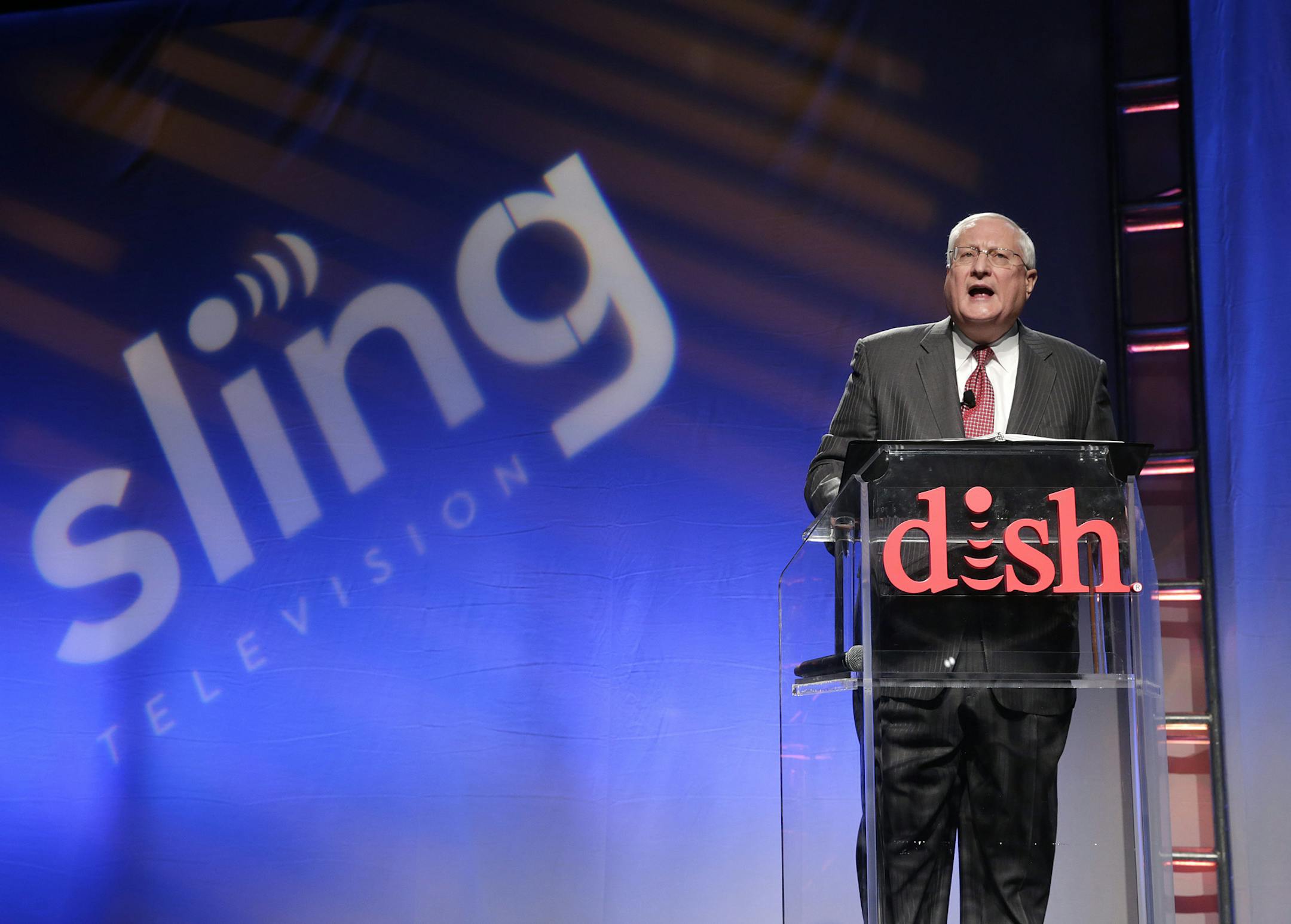 Joe Clayton, president and CEO of Dish Network, introduces the Sling TV, a live television streaming service, at a news conference at the International CES, Monday, Jan. 5, 2015, in Las Vegas. (AP Photo/Jae C. Hong)