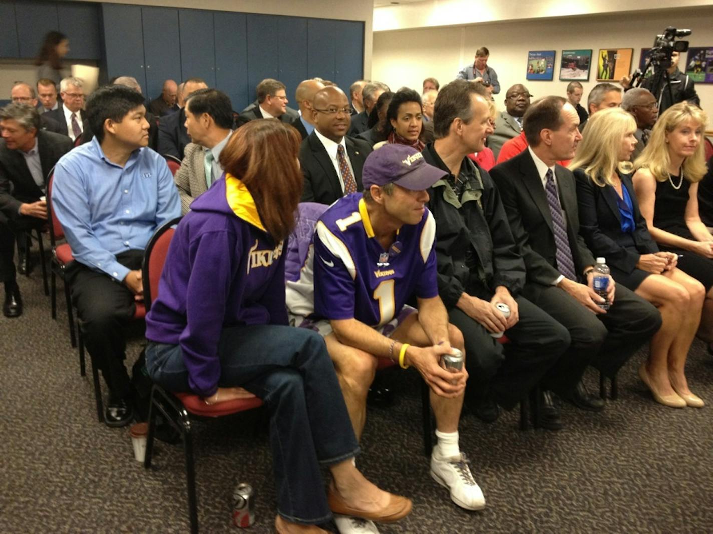 Early Friday a crowd at the Metrodome awaits the announcement of the architectural firm who will build the new Vikings stadium.