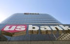 Signage is displayed on the exterior of the U.S. Bank building in Salt Lake City, Utah, U.S., on Monday, July 13, 2009. U.S. Bancorp, parent company o