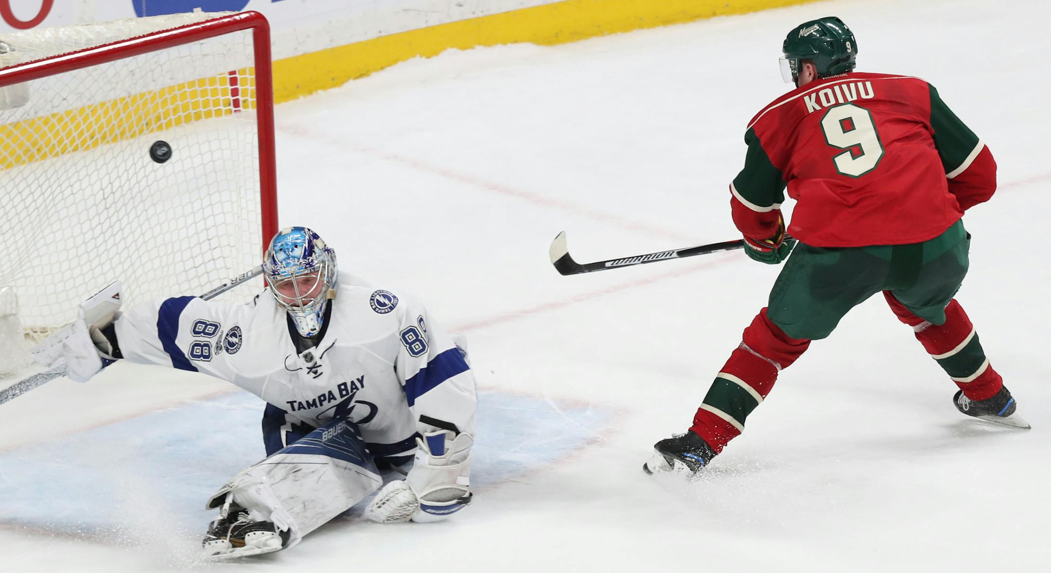 The Wild's Mikko Koivu (9) scored on Tampa Bay goalie Nikita Kucherov (86) on Friday.