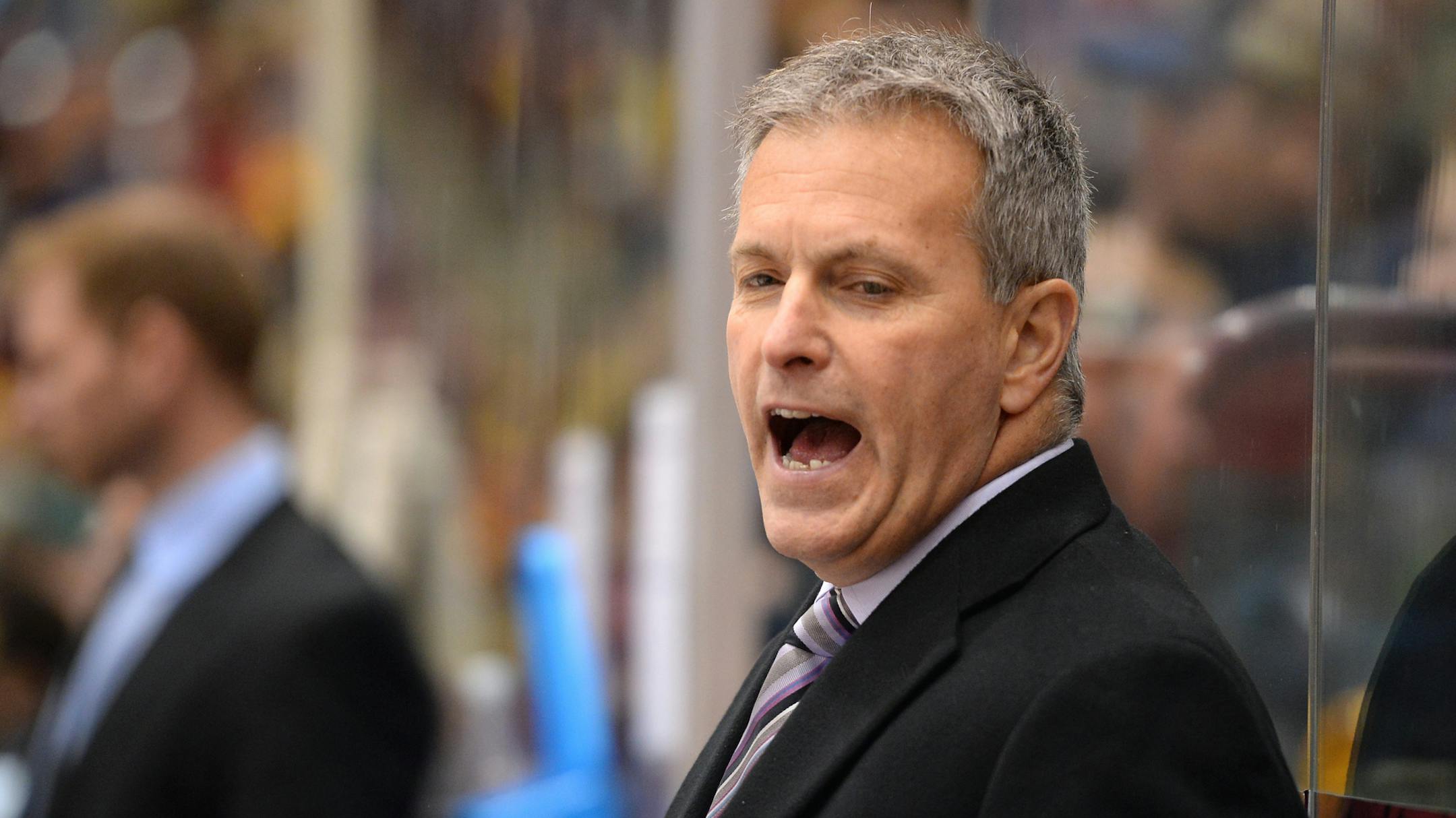 Minnesota Golden Gophers head coach Don Lucia talked to players during a third period timeout Friday. ] (AARON LAVINSKY/STAR TRIBUNE) aaron.lavinsky@startribune.com The University of Minnesota Golden Gophers men's hockey team played the Connecticut Huskies on Friday, Jan. 1, 2016 at Mariucci Arena in Minneapolis, Minn. ORG XMIT: MIN1601012207243647