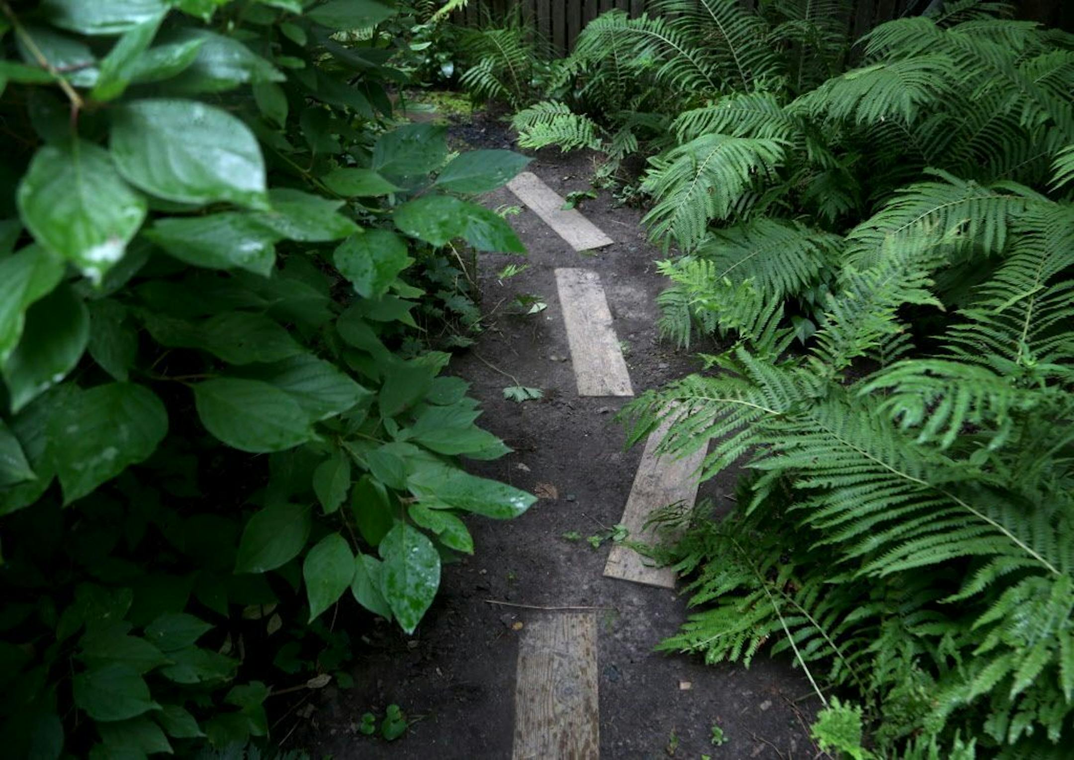 Wooden pavers recycled from deck boards.