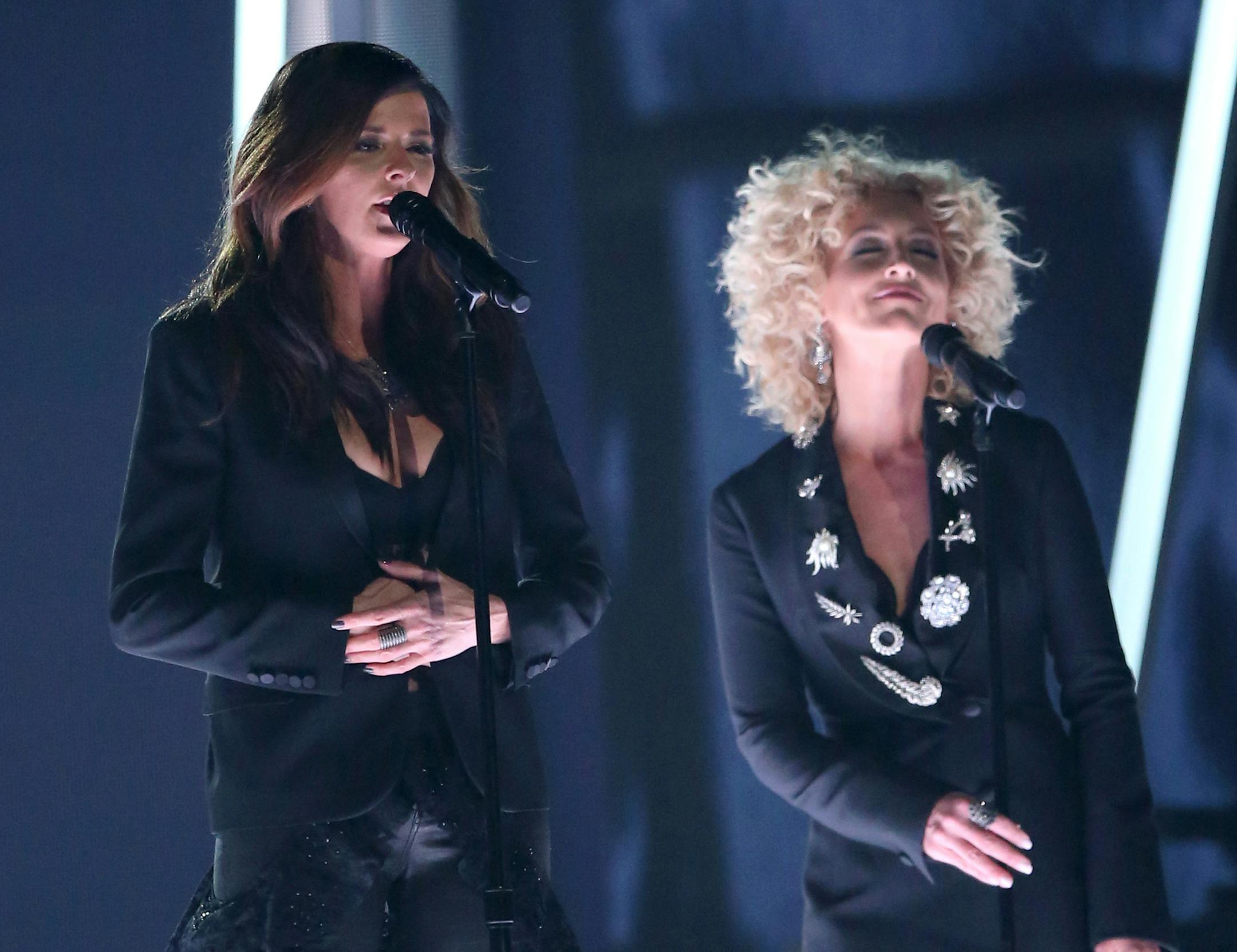 Karen Fairchild, left, and Kimberly Schlapman of Little Big Town perform "Girl Crush" at the 58th annual Grammy Awards on Monday, Feb. 15, 2016, in Los Angeles. (Photo by Matt Sayles/Invision/AP)
