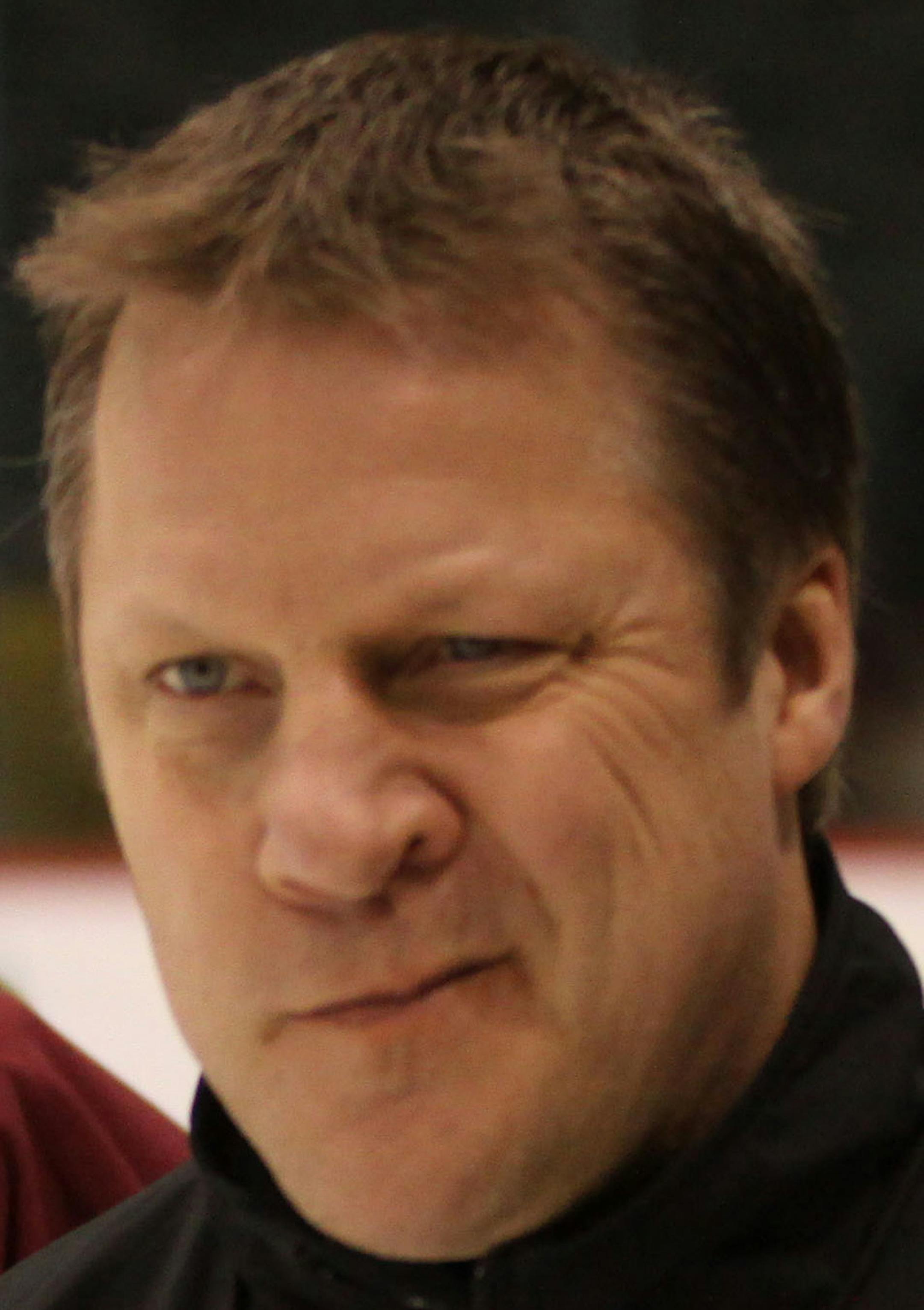 BRUCE BISPING ‚Ä¢ bbisping@startribune.com St. Paul, MN., Friday, 4/8/11] NCAA Frozen Four final practices. (left to right) Minnesota Duluth goalie Kenny Reiter and head coach Scott Sandelin skated to the bench during the final practice at Xcel center before the championship game against Michigan.