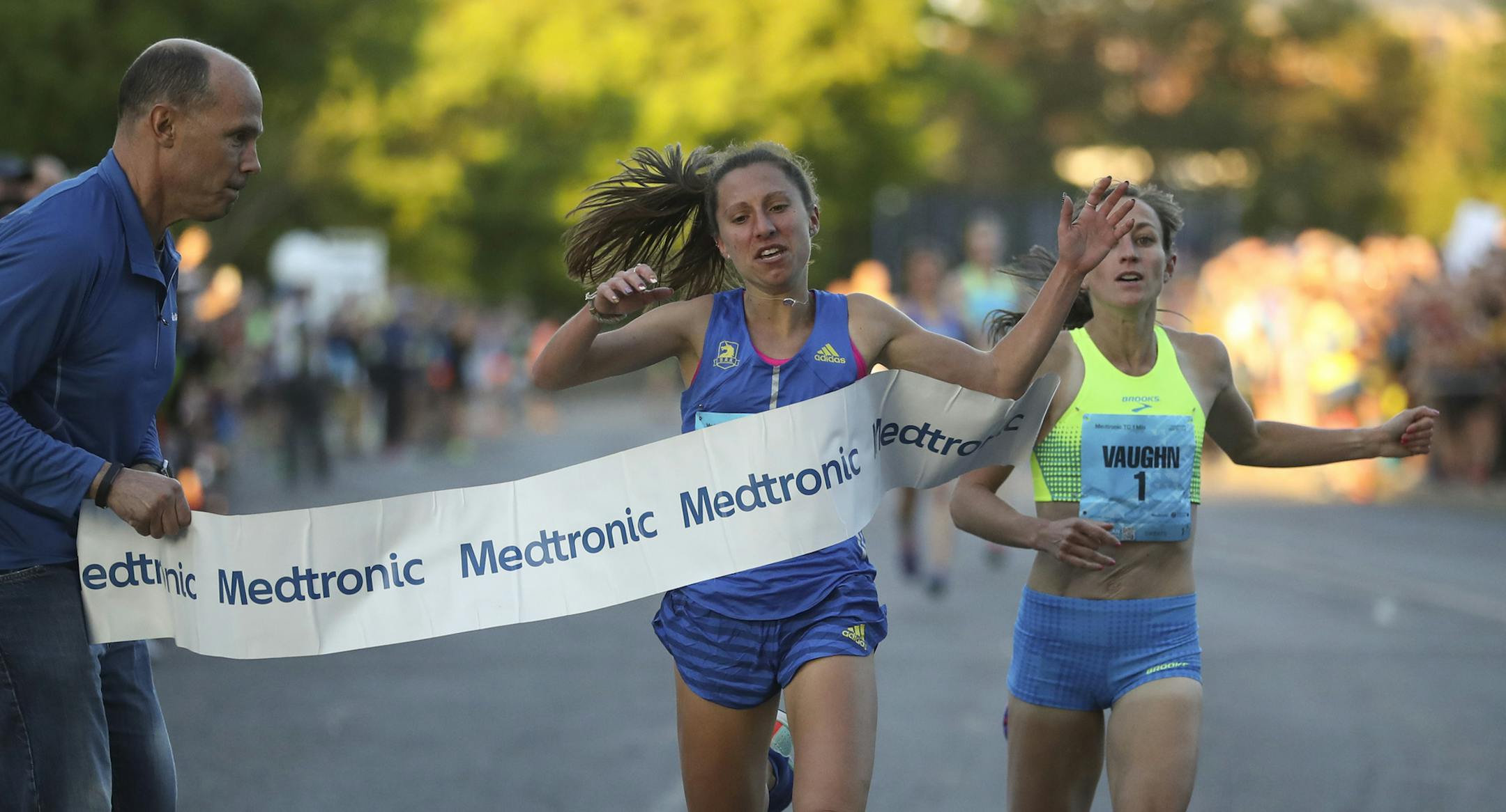 Emily Lipari of Boston edged Sara Vaughn of Boulder near the finish to take the women’s professional race.
