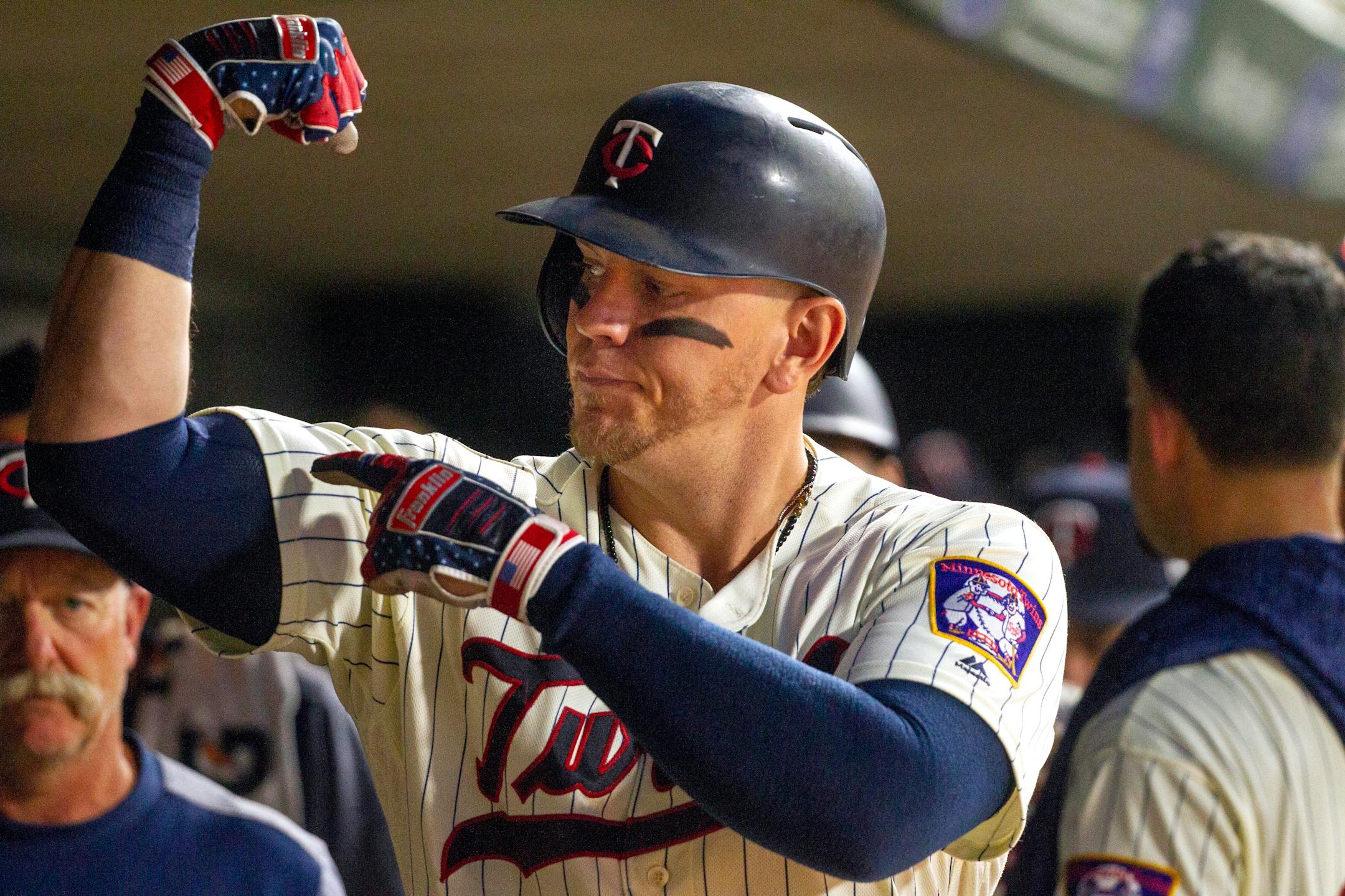 Minnesota Twins Logan Morrison celebrates his two-run home run against the Kansas City Royals in the seventh inning of a baseball game Saturday, Aug. 4, 2018, in Minneapolis. (AP Photo/Bruce Kluckhohn)