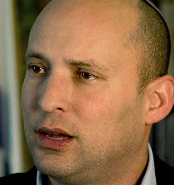 Naftali Bennett, leader of the Jewish Home party, speaks during an interview to the Associated Press in Jerusalem, Monday, Feb. 16, 2015. With Benjami