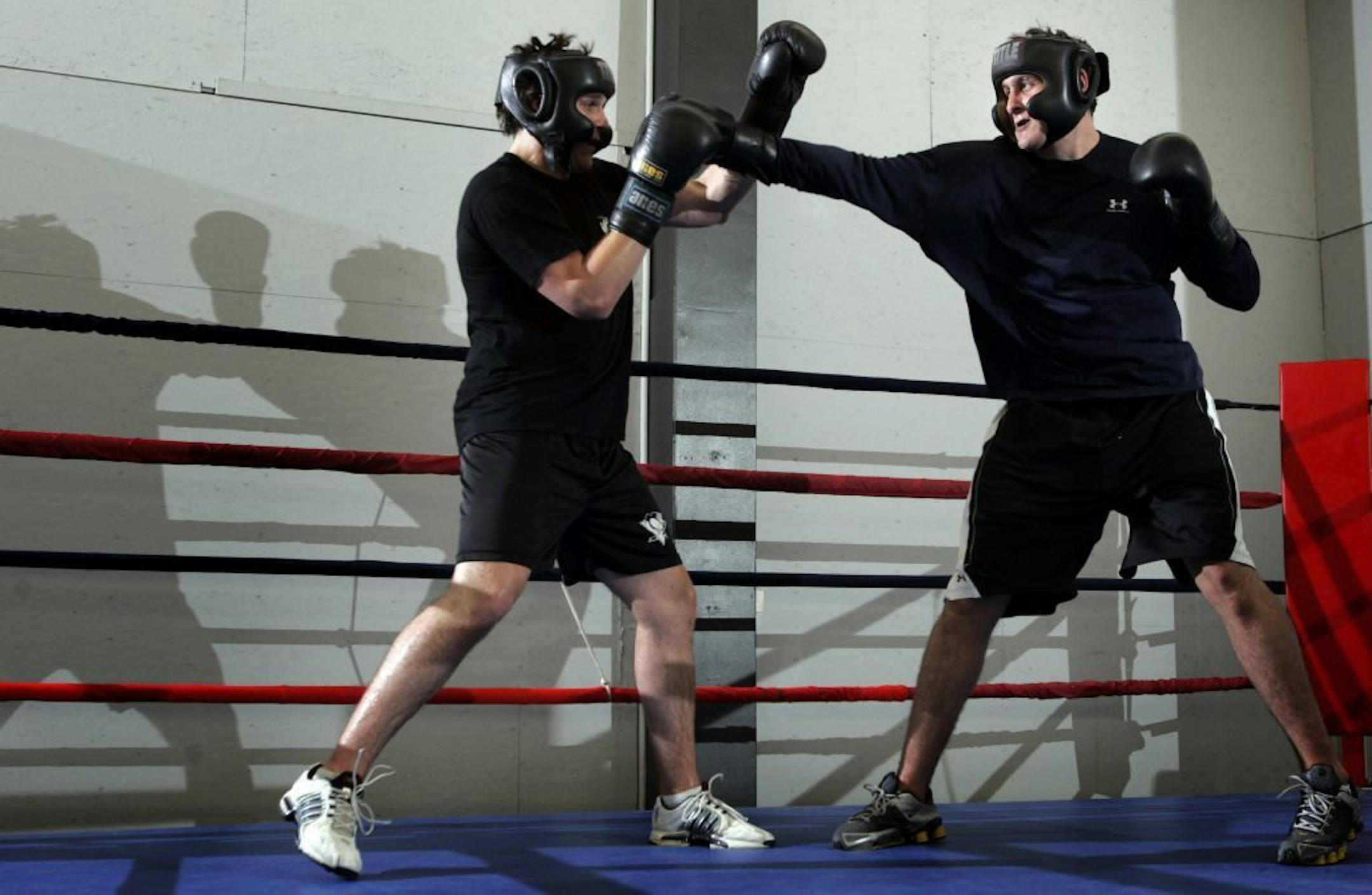 Derek Boogaard, right, trained with his brother Aaron at Lonsdale Boxing Club in Regina, Saskatchewan, in 2007.