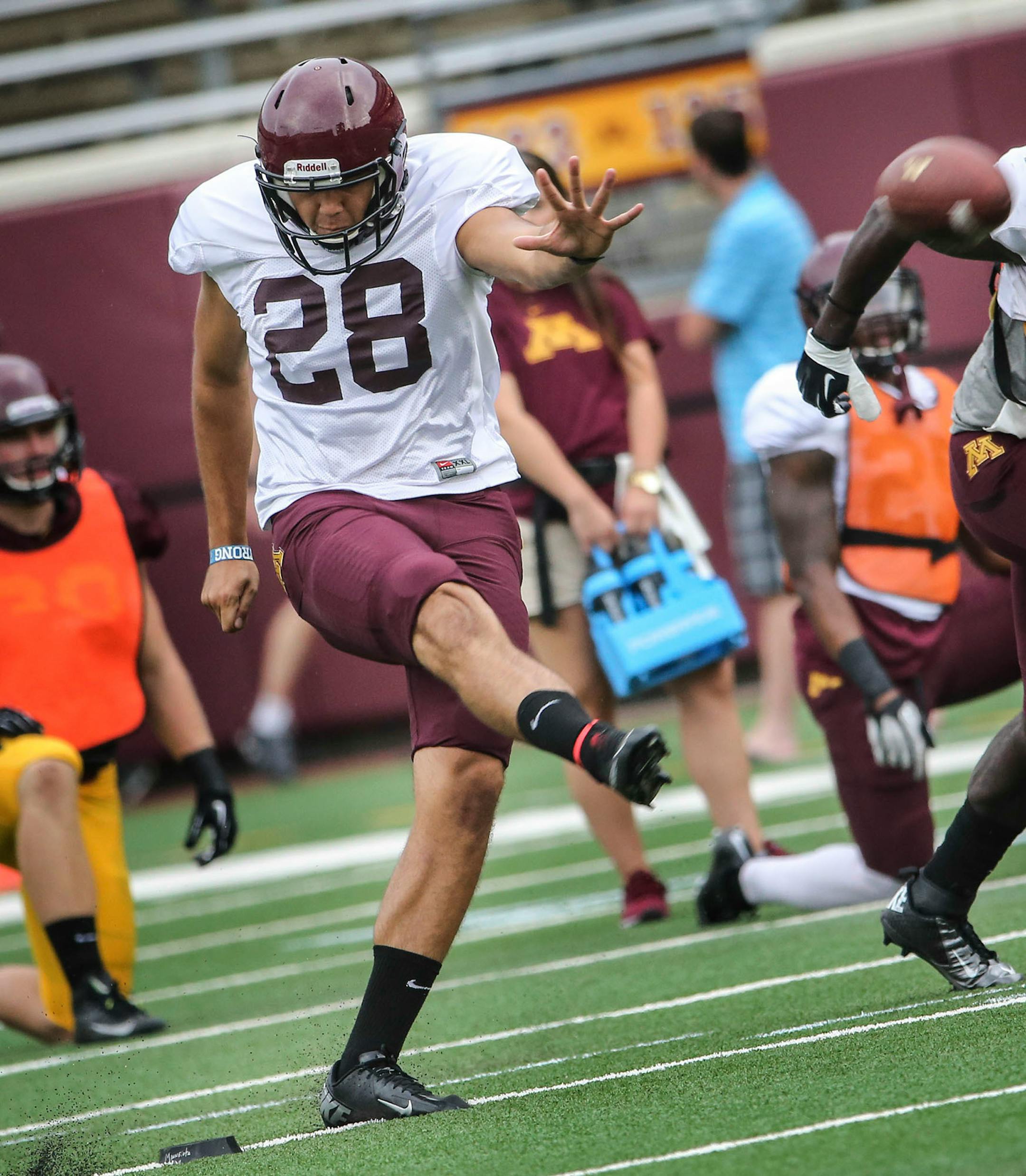 Gophers kicker Ryan Santoso before the start of a scrimmage on Aug. 9.