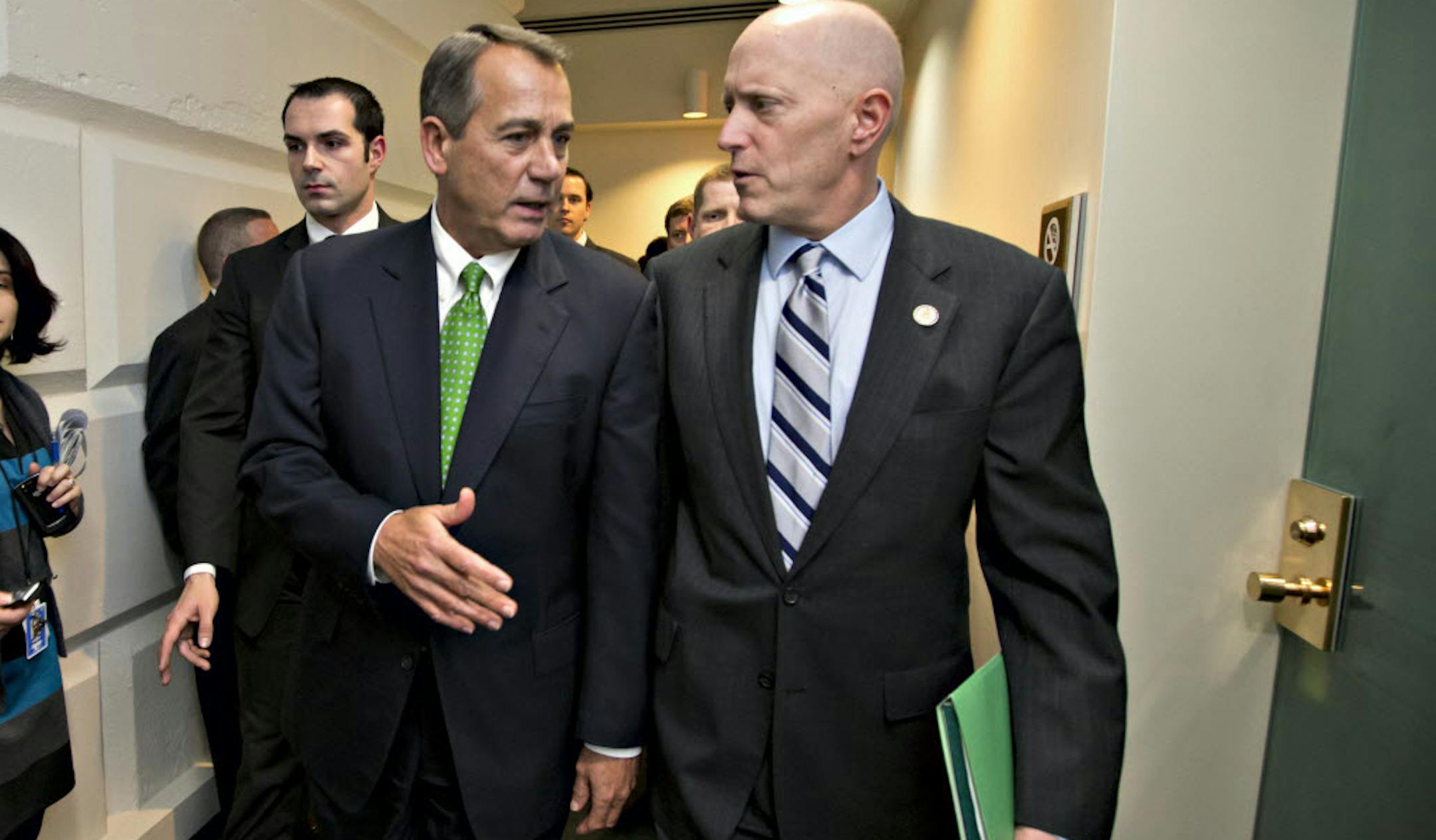 Speaker of the House John Boehner, R-Ohio, left, and House Ways and Means Committee Chairman Dave Camp, R-Mich.