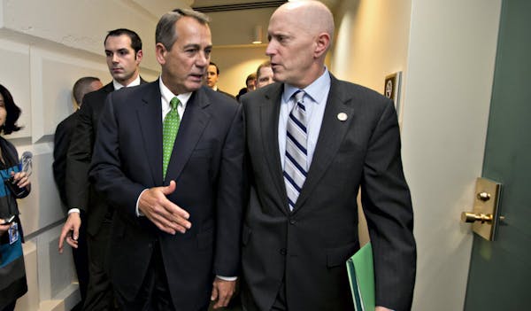 Speaker of the House John Boehner, R-Ohio, left, and House Ways and Means Committee Chairman Dave Camp, R-Mich.